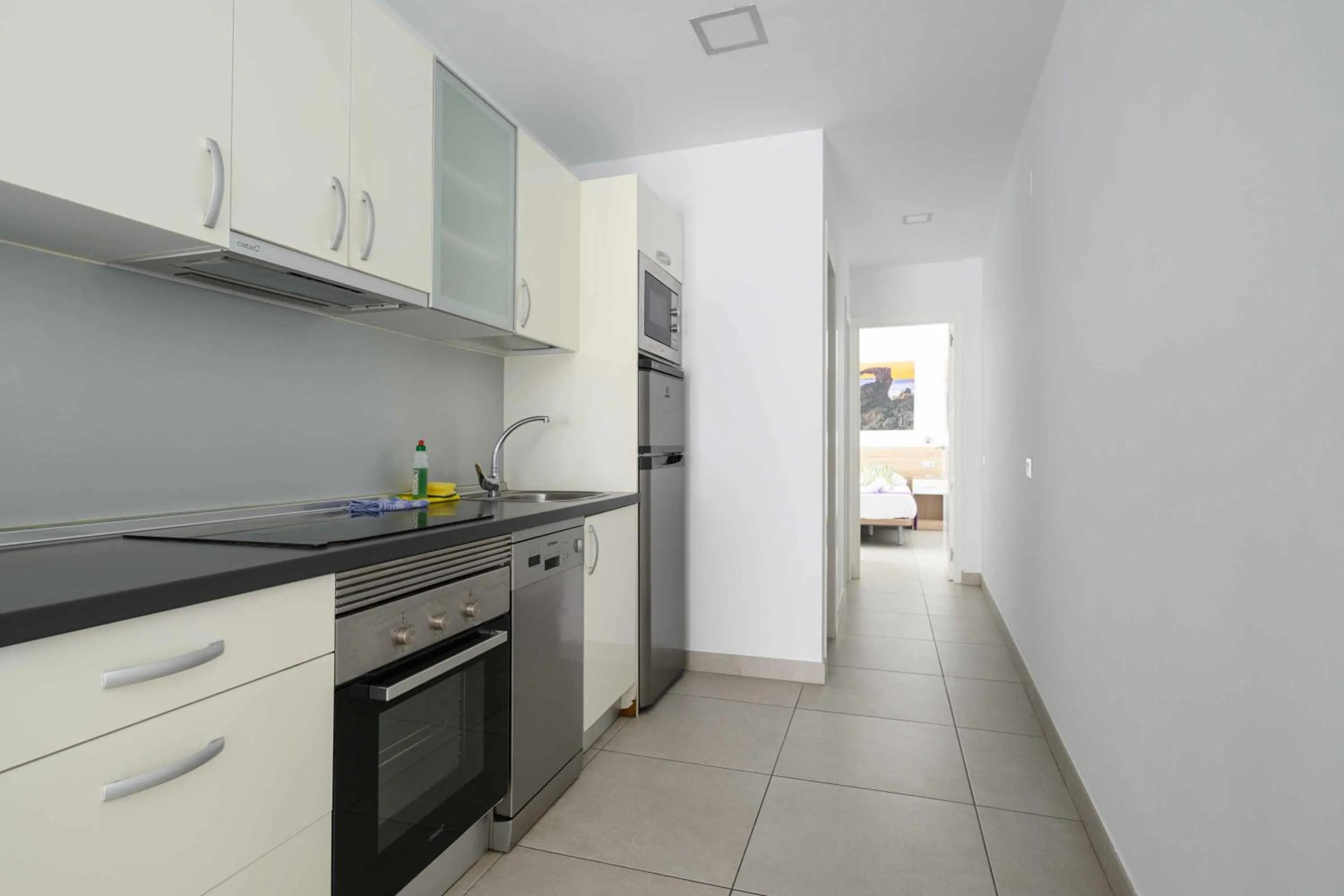 Kitchen or kitchenette in Canteras Suites