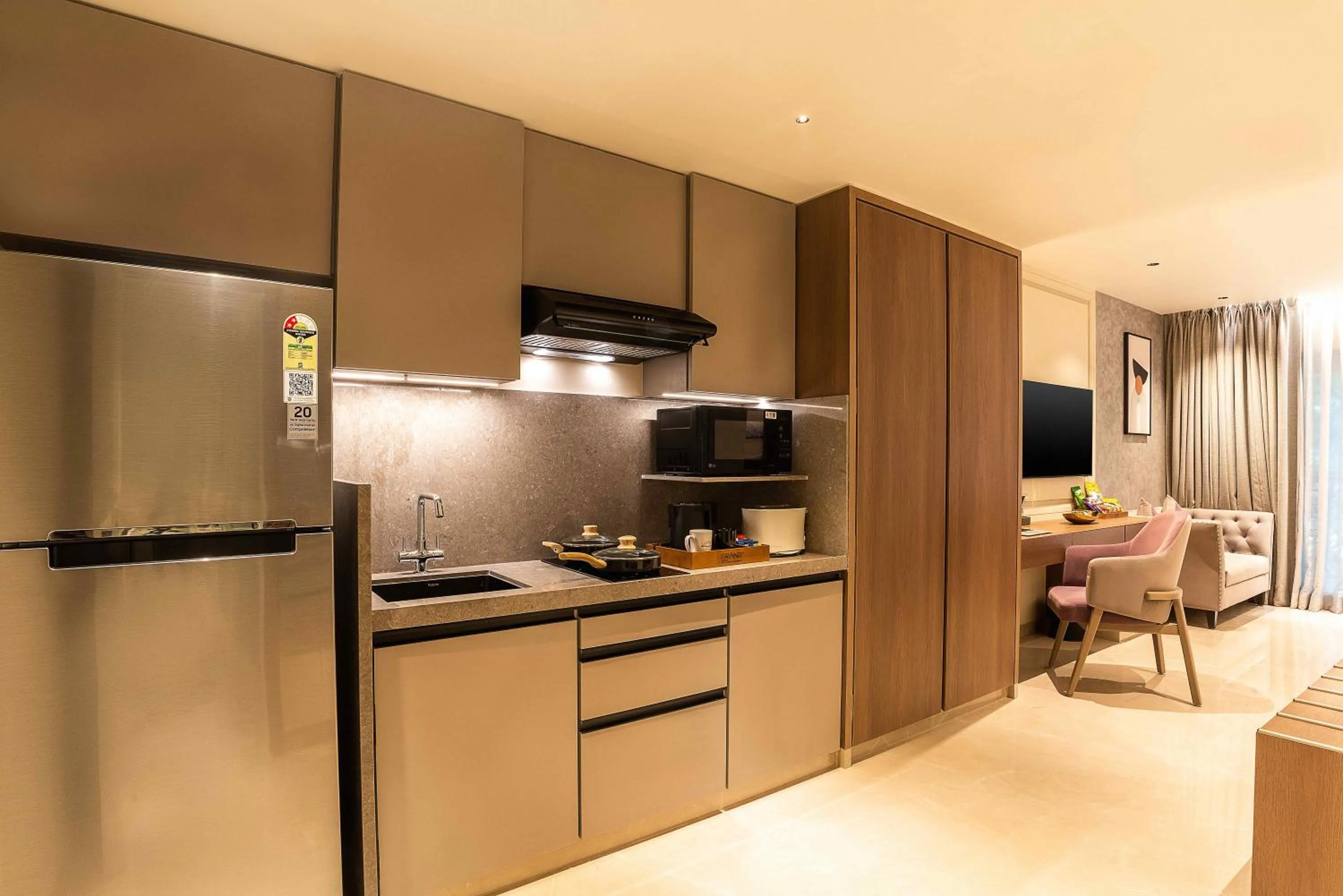 Kitchen or kitchenette in Grand Residency Hotel & Serviced Apartments
