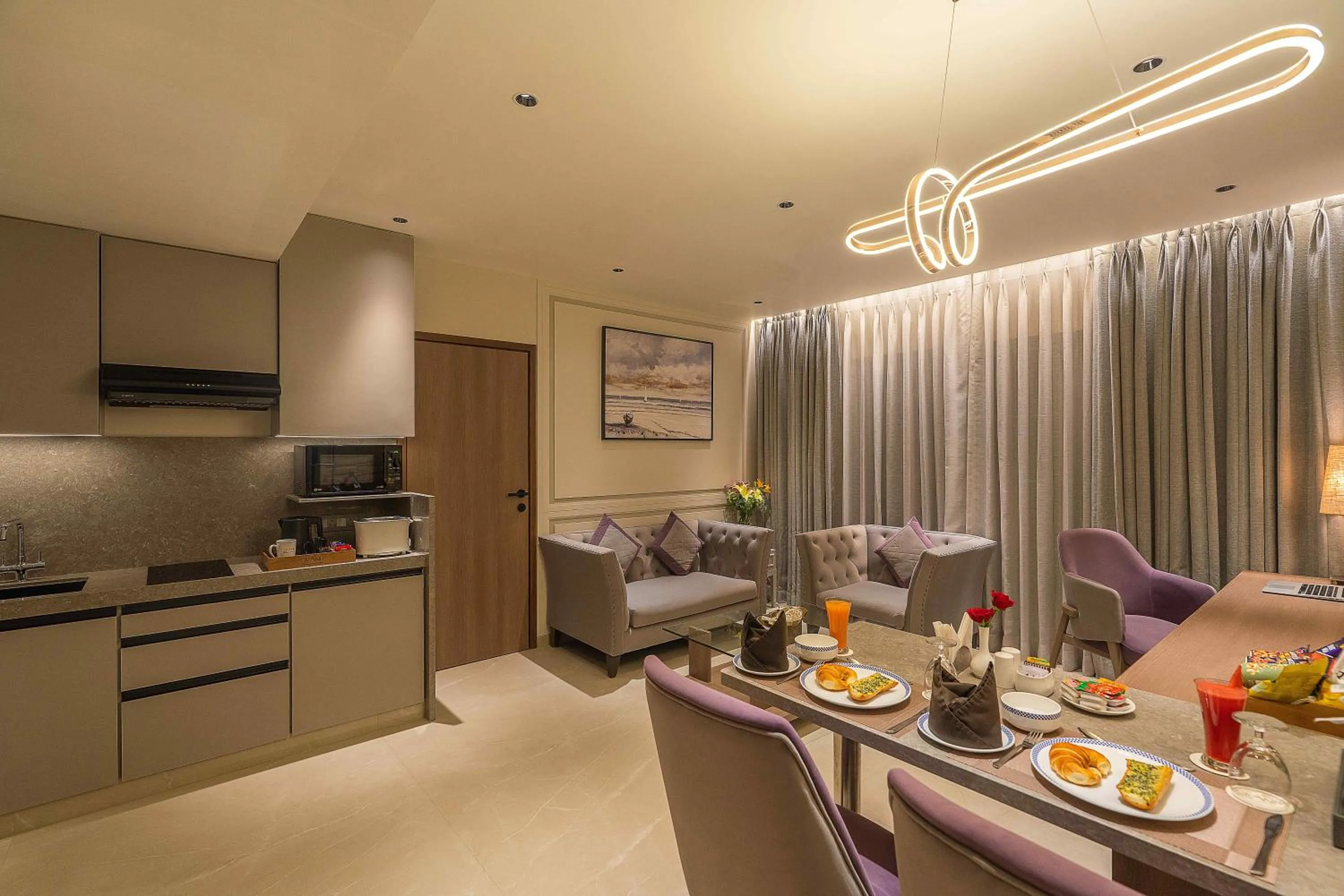 Kitchen or kitchenette in Grand Residency Hotel & Serviced Apartments