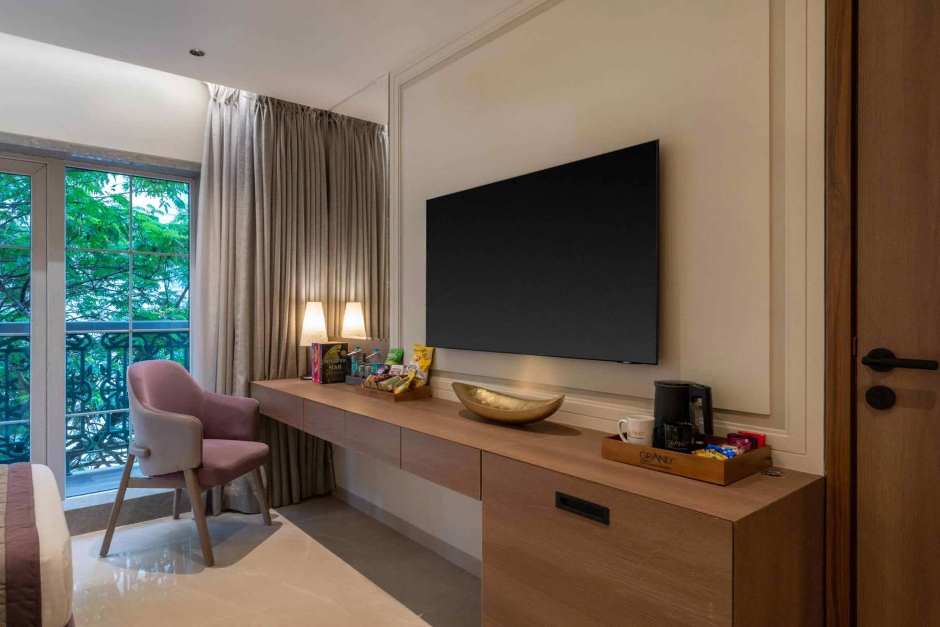 TV and multimedia in Grand Residency Hotel & Serviced Apartments