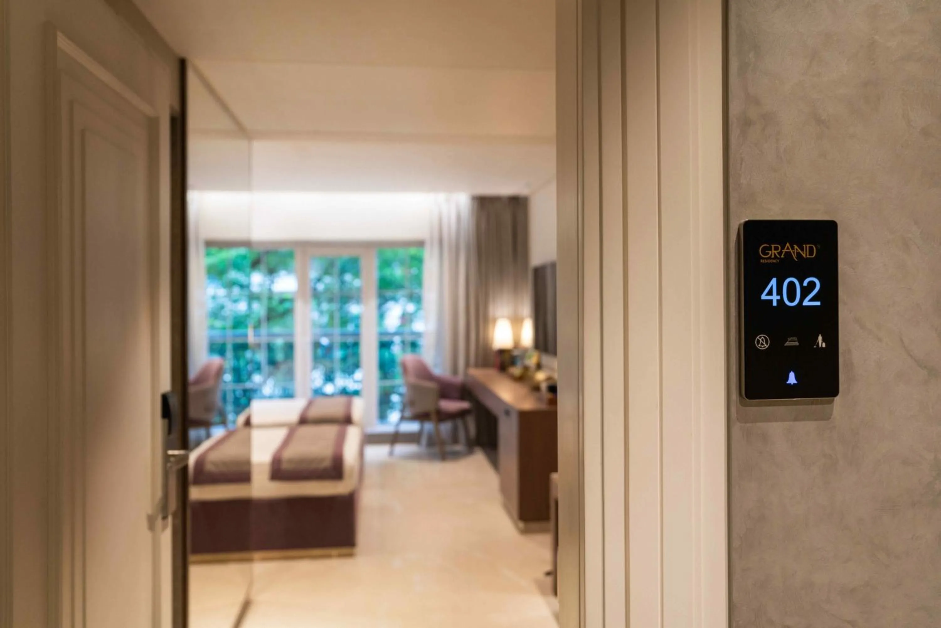 Photo of the whole room, Bed in Grand Residency Hotel & Serviced Apartments