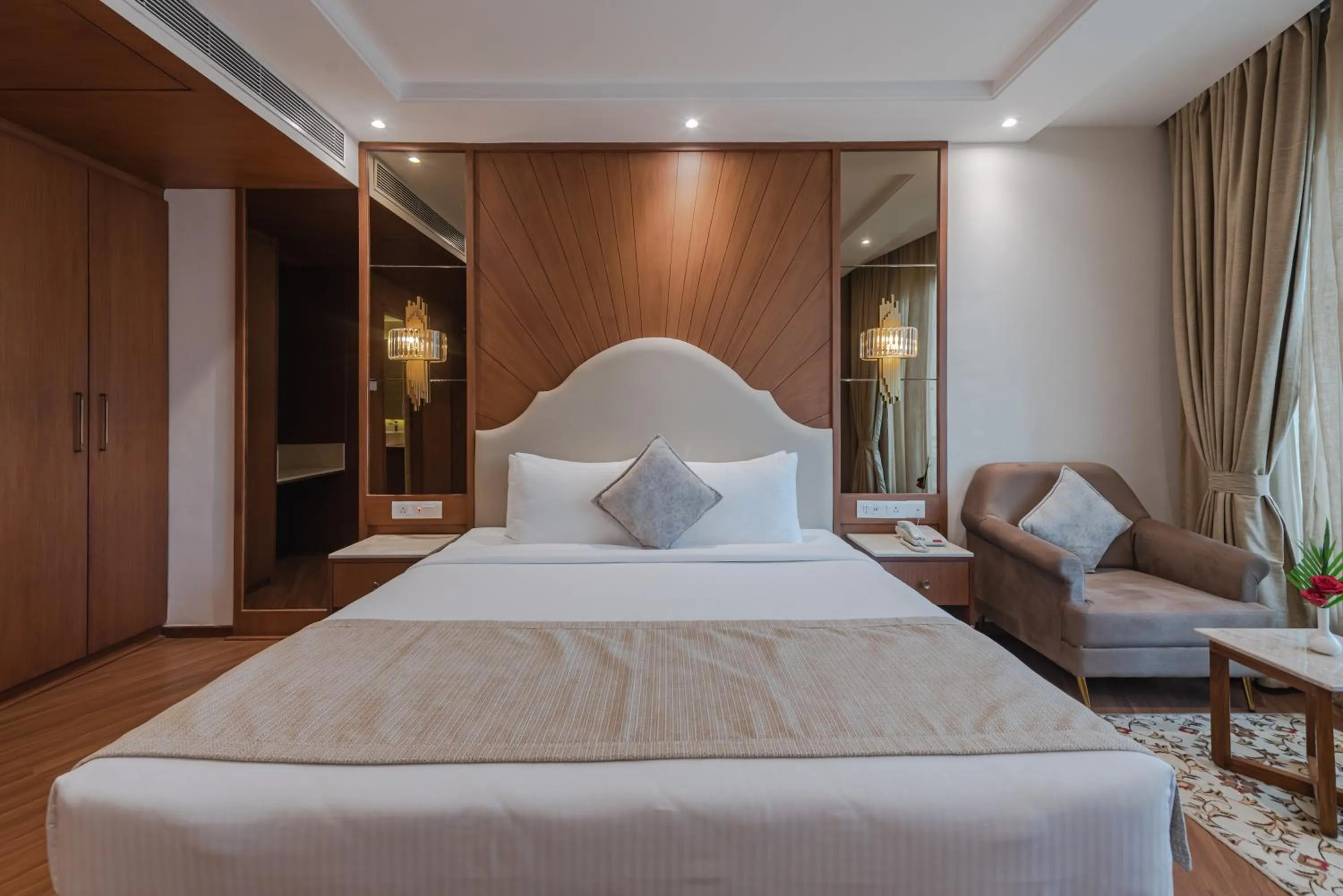 Bed in Goldfinch Hotel Mangalore