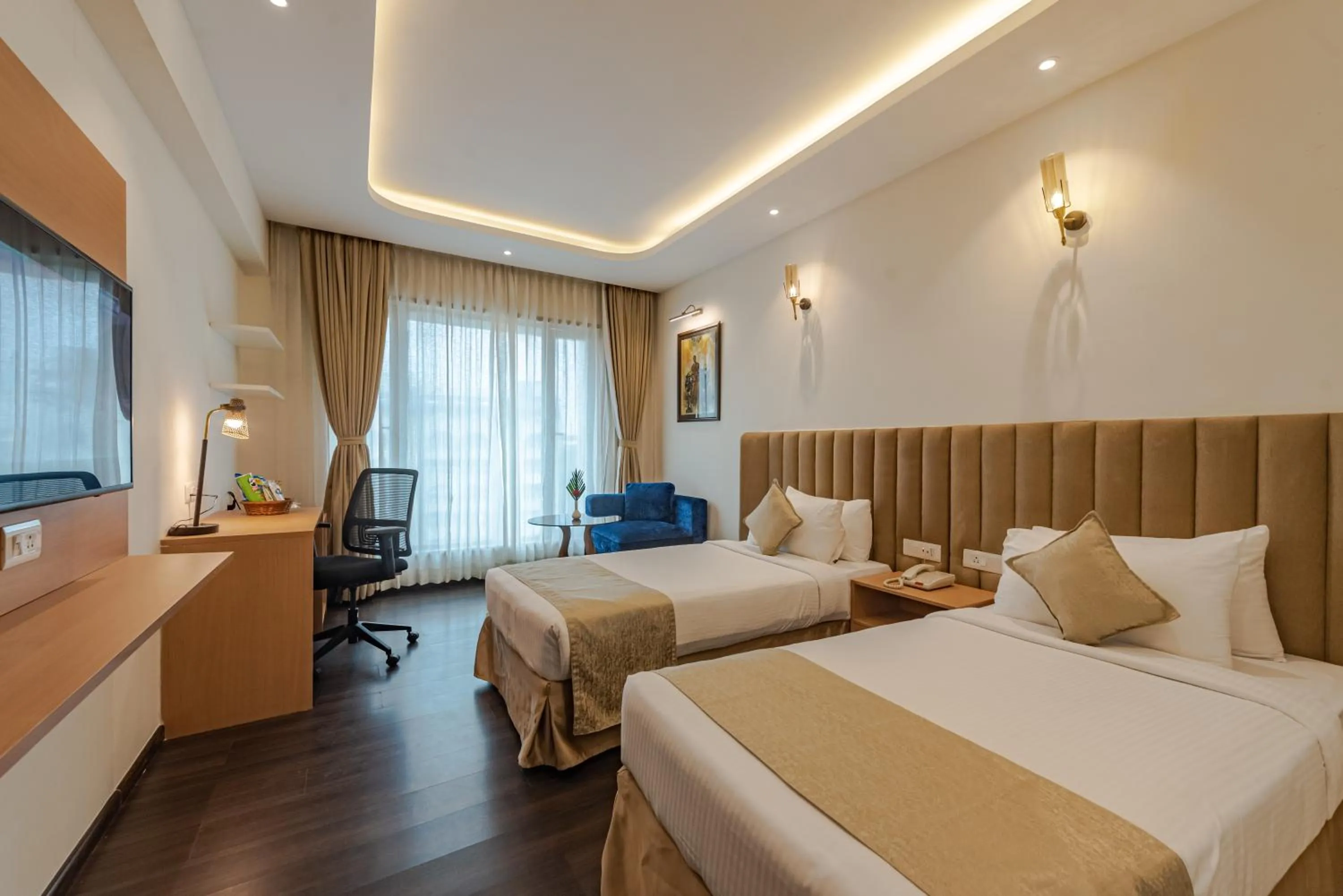 Bed in Goldfinch Hotel Mangalore