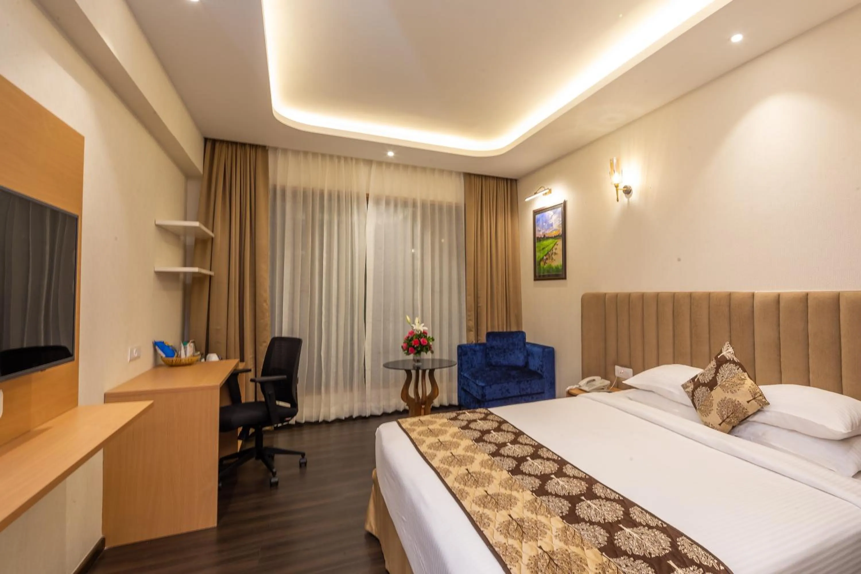 Bed in Goldfinch Hotel Mangalore
