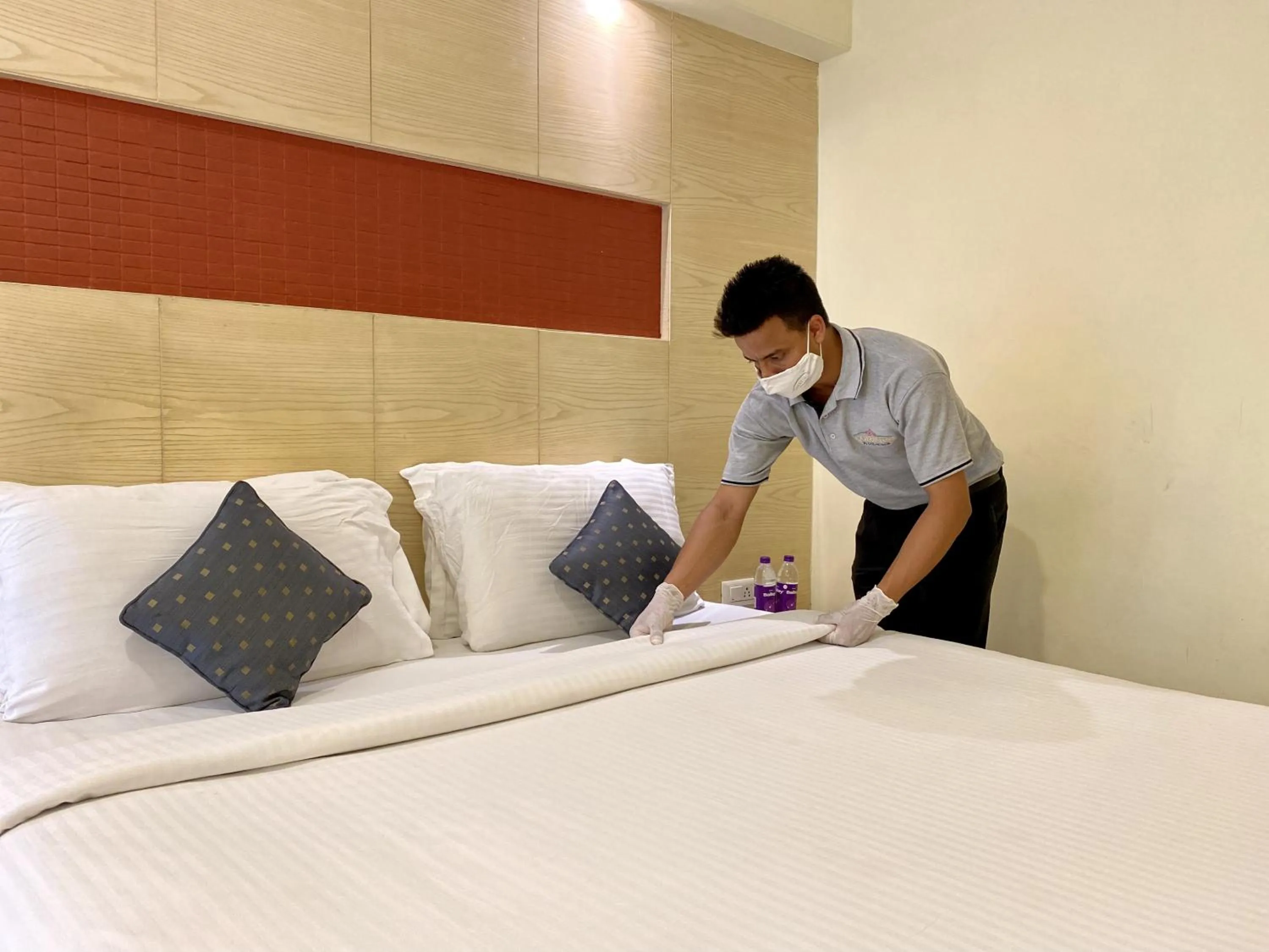Staff, Bed in Coraltree Hotel Bangalore
