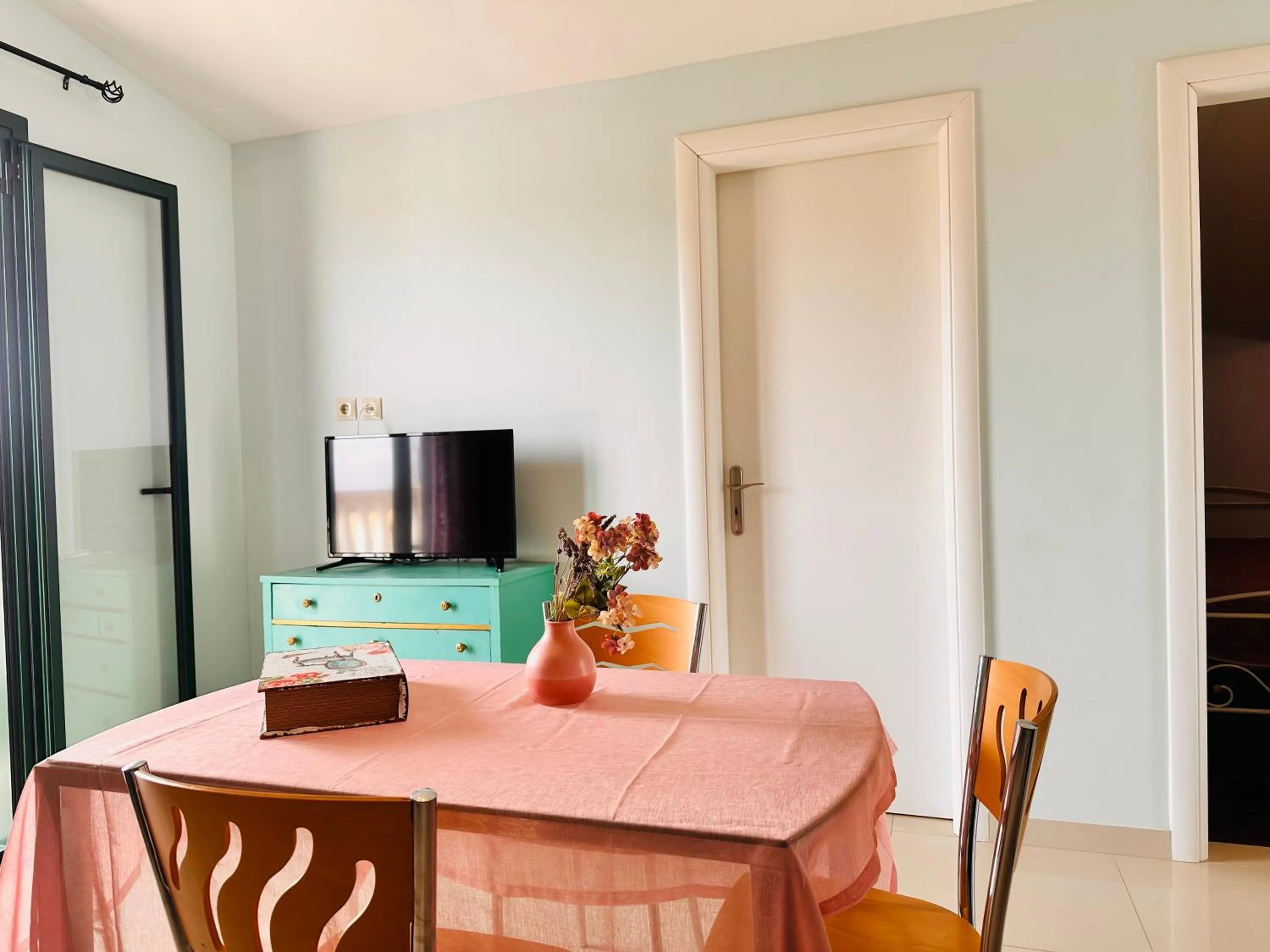 TV and multimedia in Infinity blue beach apartments - Renovated Apartments 2 Minutes from the Sea & Pool with Scenic Views