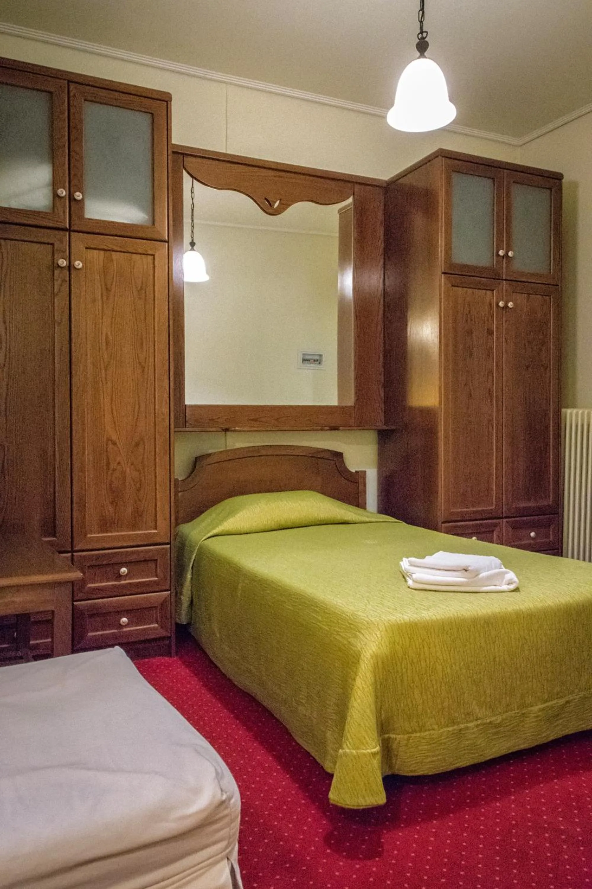 Bed in City Hotel Apollonion