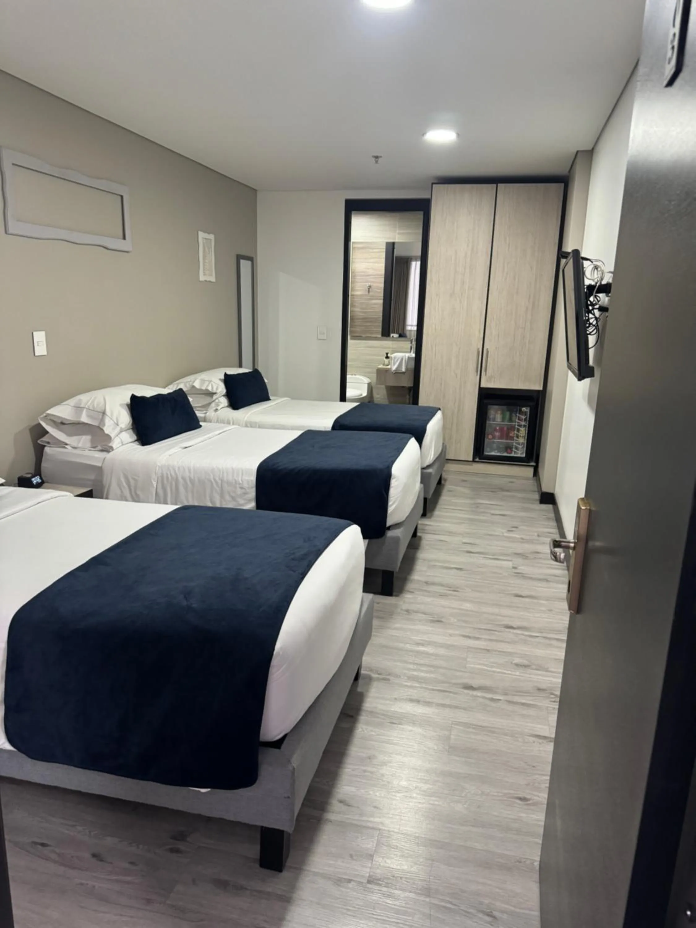 Bed in Hotel WLH Silver Bogota - White Lighthouse