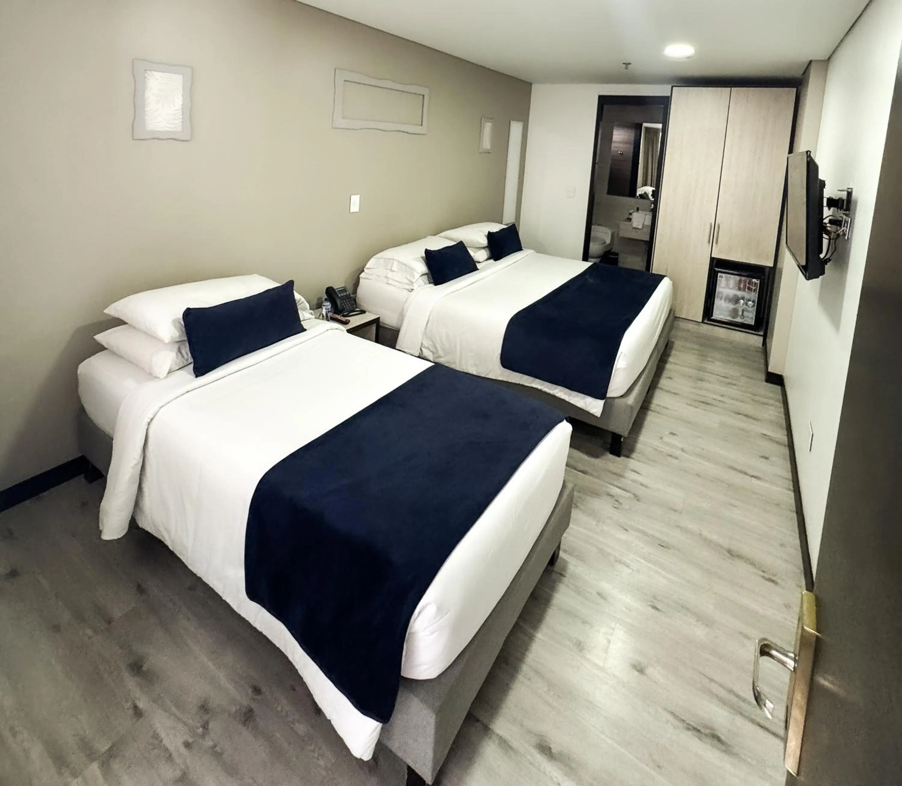 Bed in Hotel WLH Silver Bogota - White Lighthouse