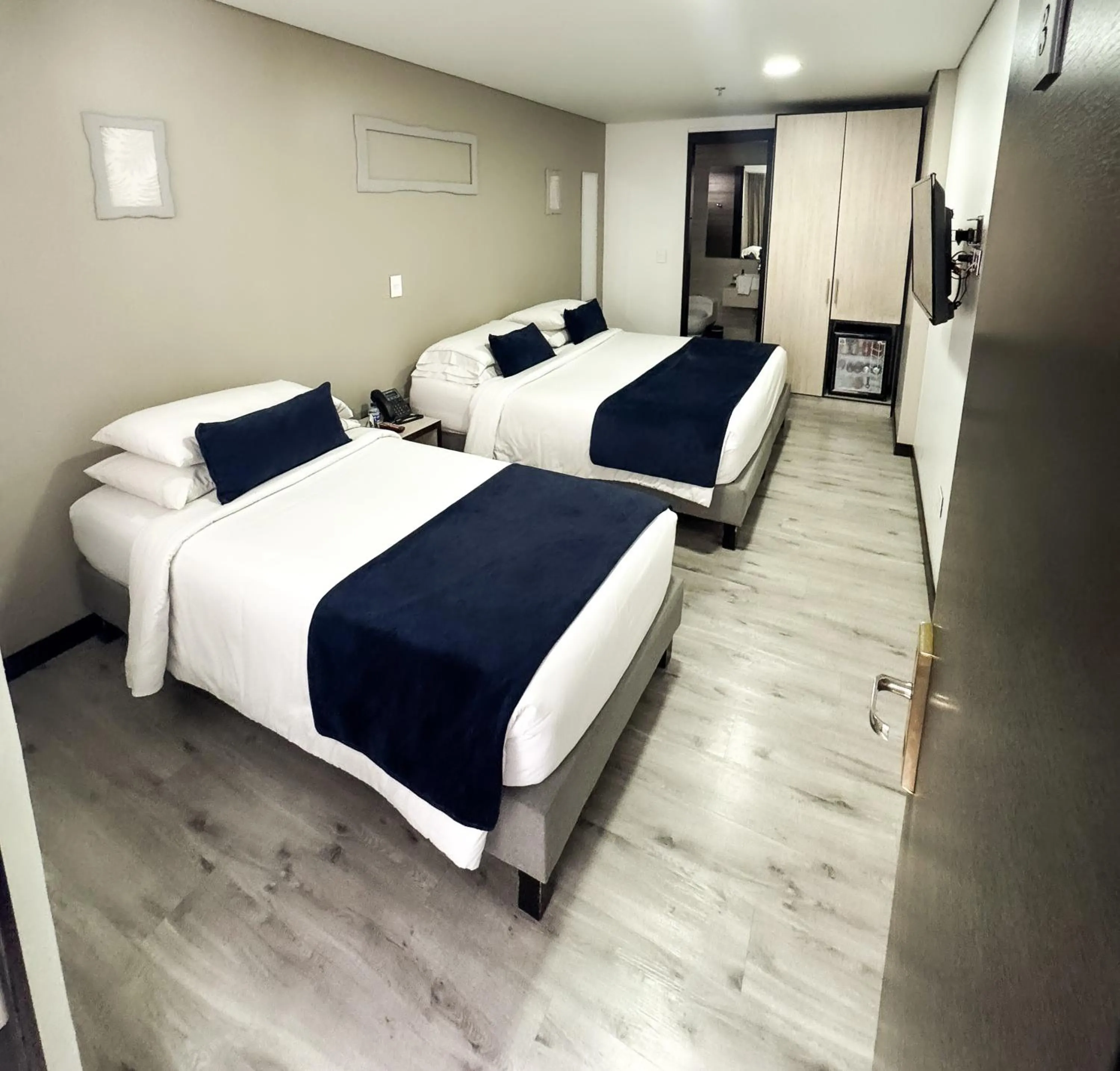 Bed in Hotel WLH Silver Bogota - White Lighthouse