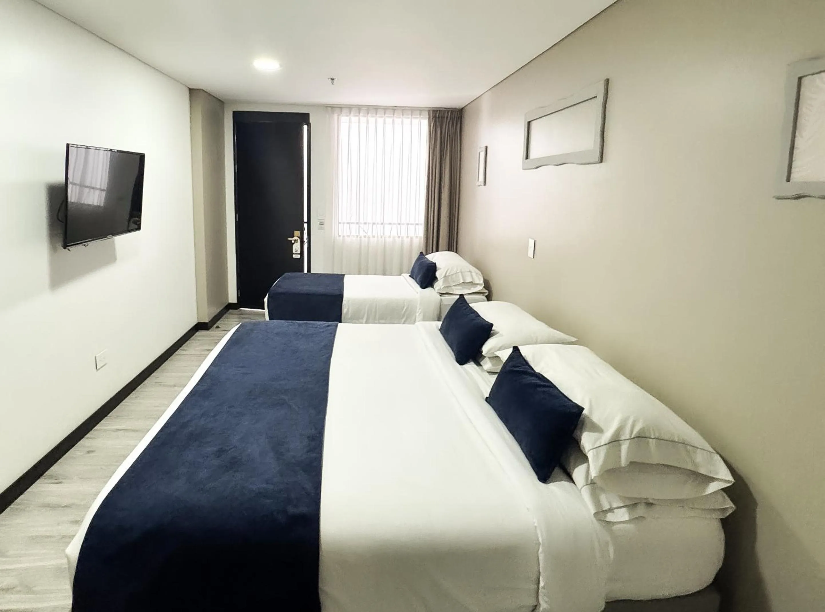 Bed in Hotel WLH Silver Bogota - White Lighthouse