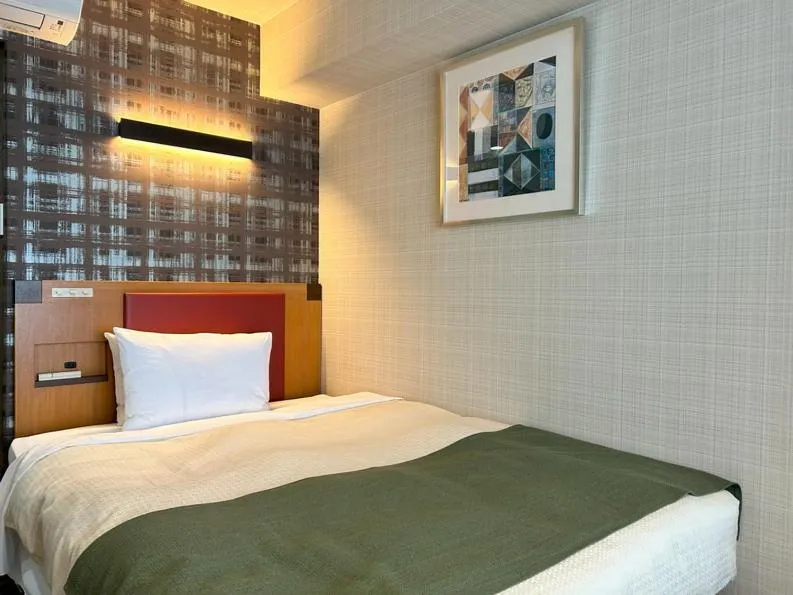 Bed in Garden Hotel Shizuoka