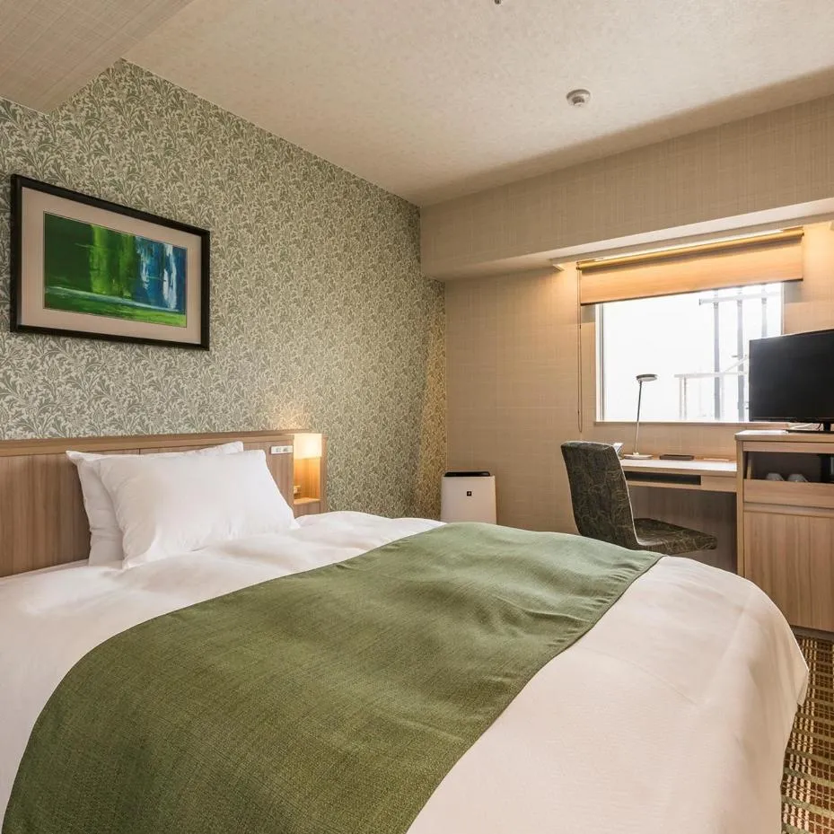 Bed in Garden Hotel Shizuoka