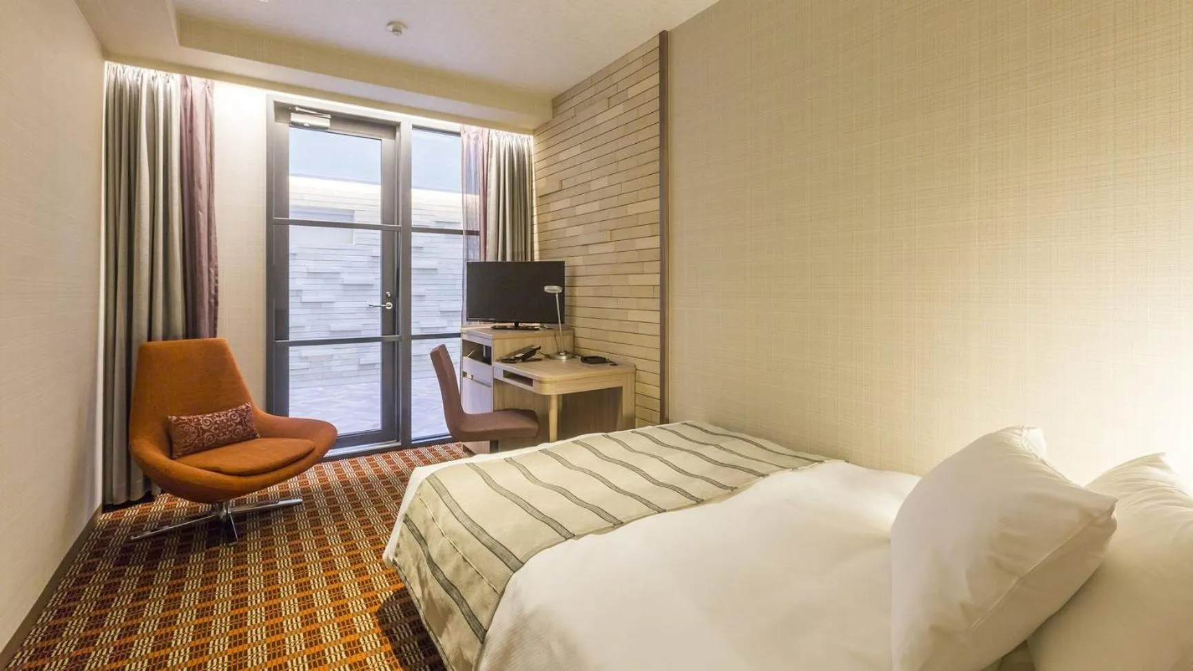 Bed in Garden Hotel Shizuoka