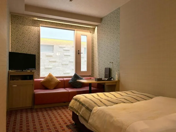 Bed in Garden Hotel Shizuoka