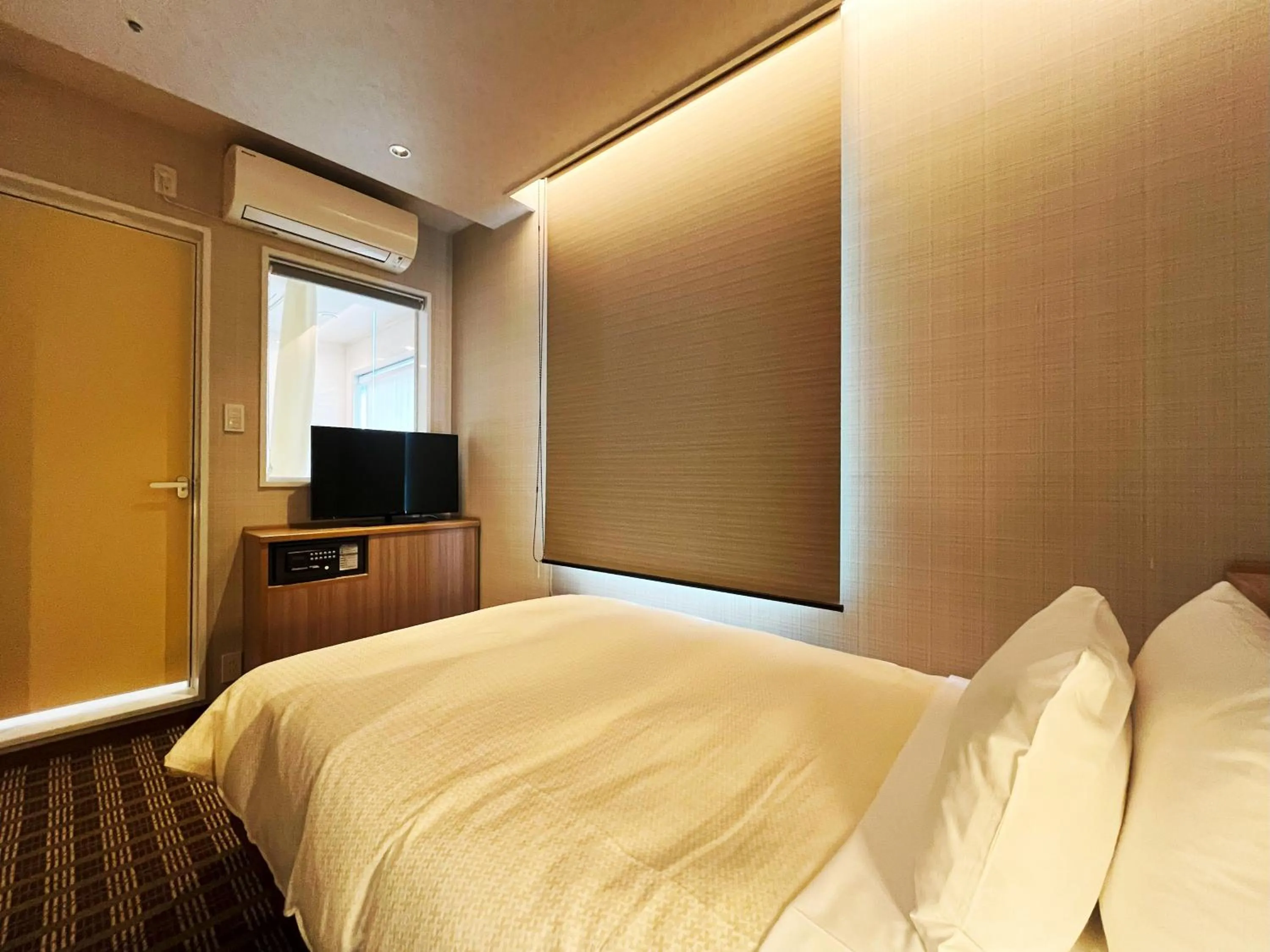 Bed in Garden Hotel Shizuoka