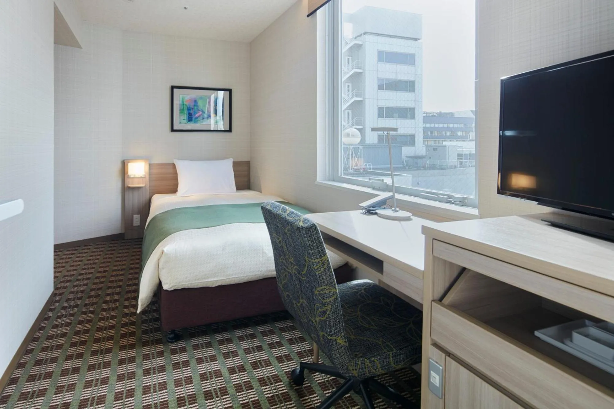 Bed in Garden Hotel Shizuoka