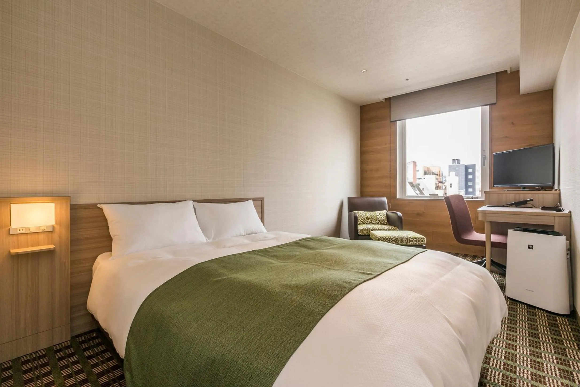 Bed in Garden Hotel Shizuoka