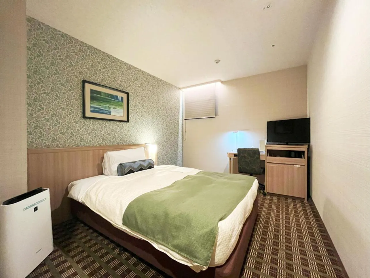 Bed in Garden Hotel Shizuoka