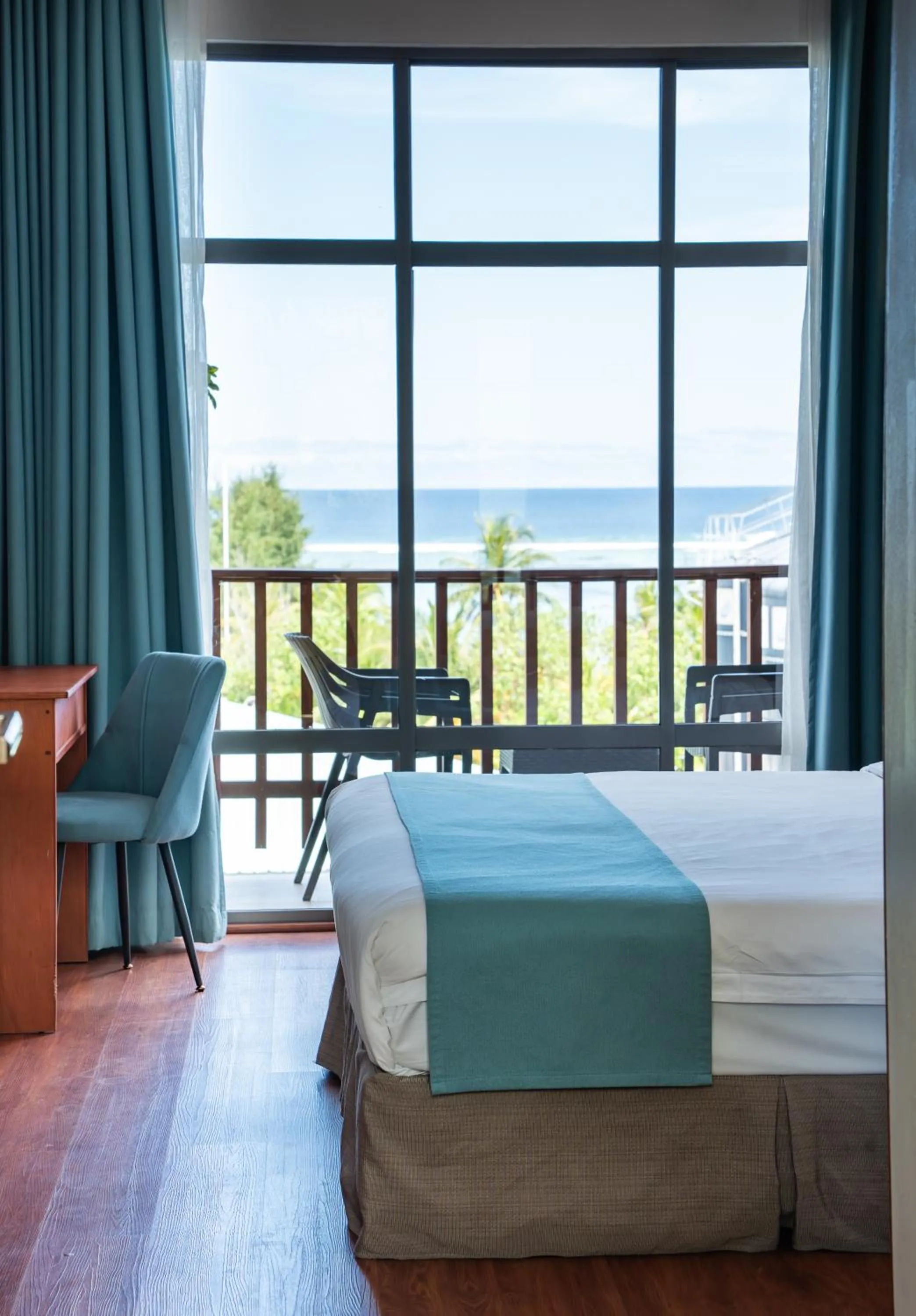 Balcony/Terrace, Bed in Araamu Hotels Maldives at Dhiffushi