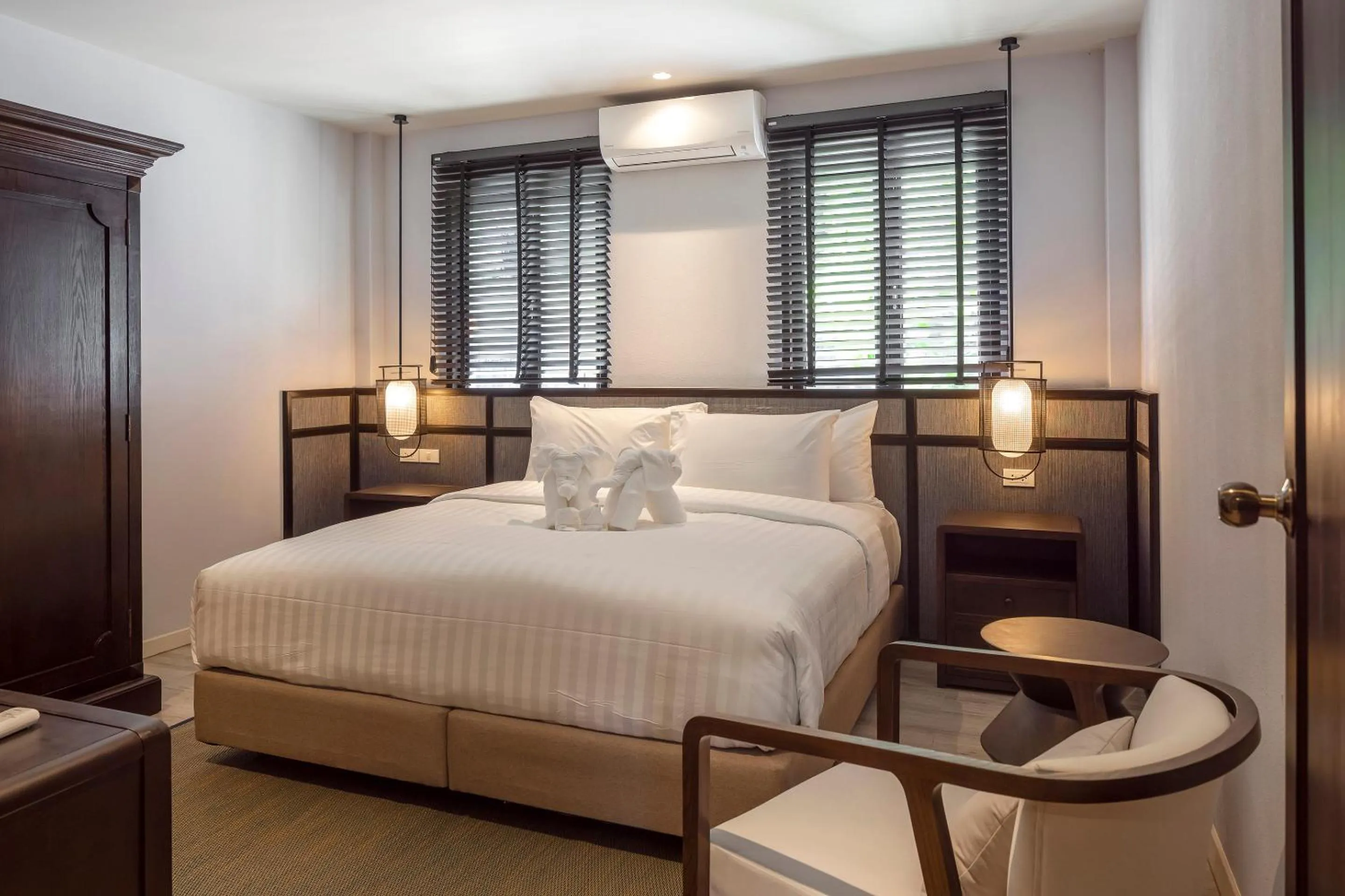 Bed in The Pe La Resort, Phuket - SHA Extra Plus