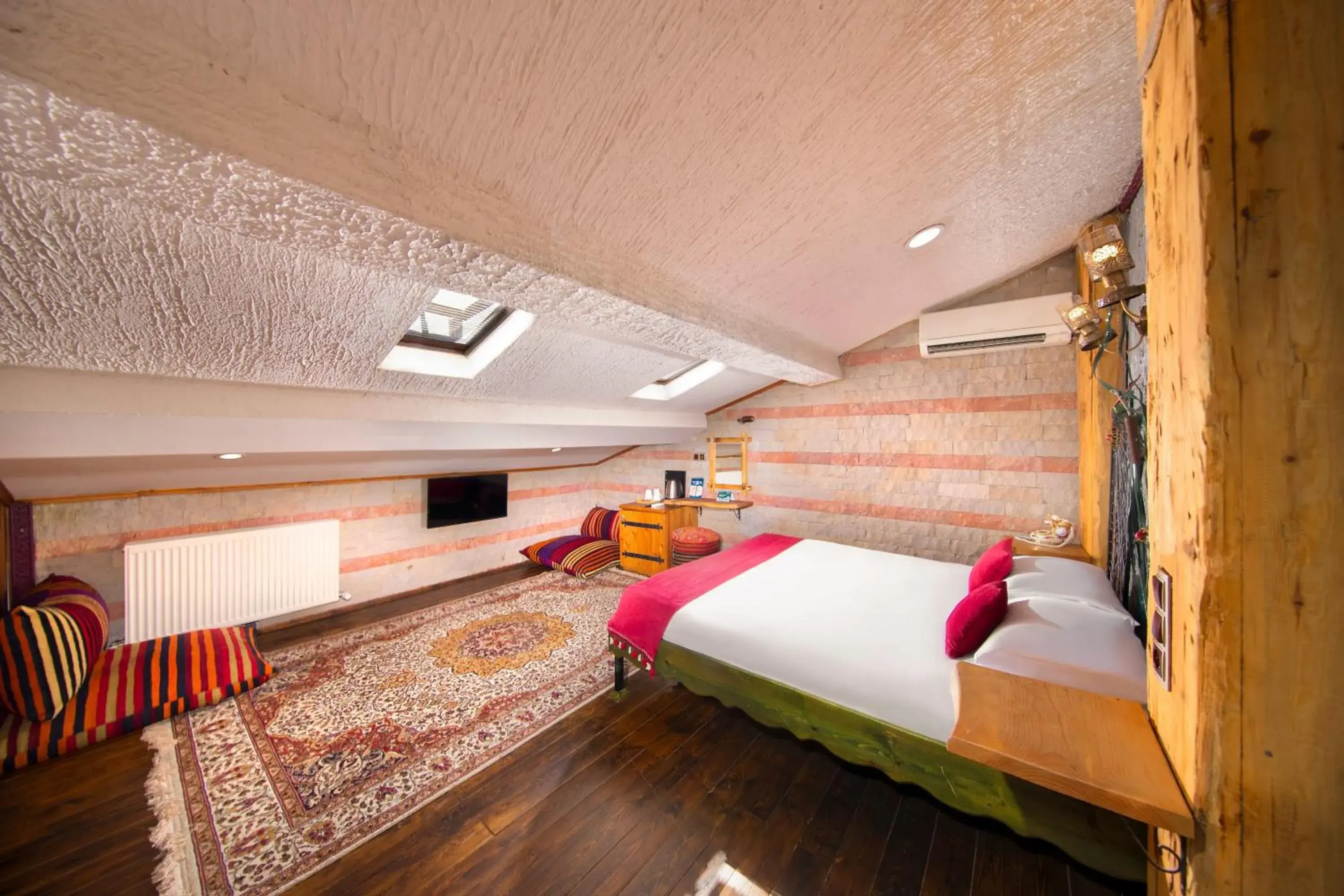 Deluxe Room (2 Adults + 1 Child) in Aja Cappadocia Cave Hotel Deluxe Room (2 Adults + 1 Child) in Aja Cappadocia Cave Hotel