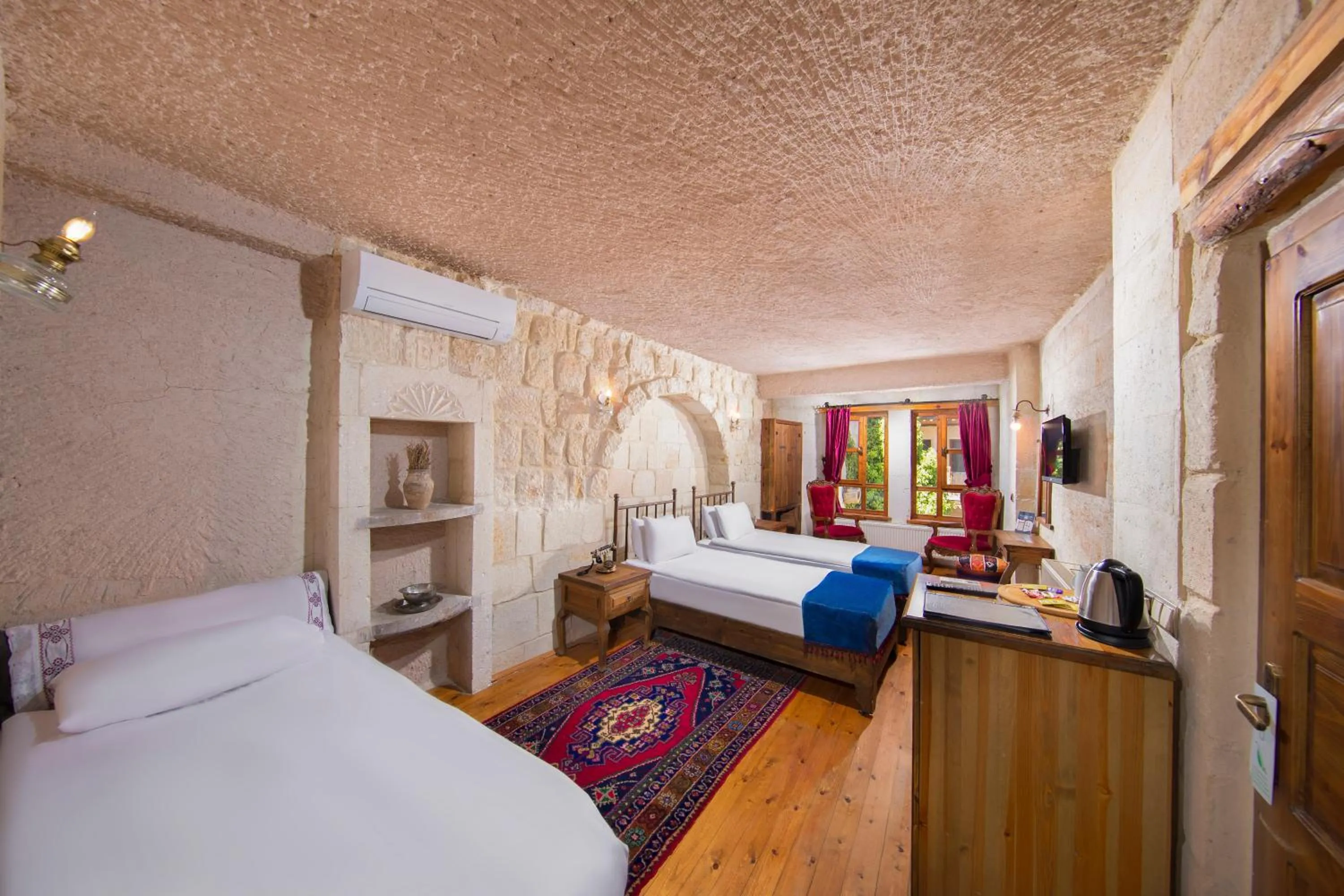 Bed in Aja Cappadocia Cave Hotel