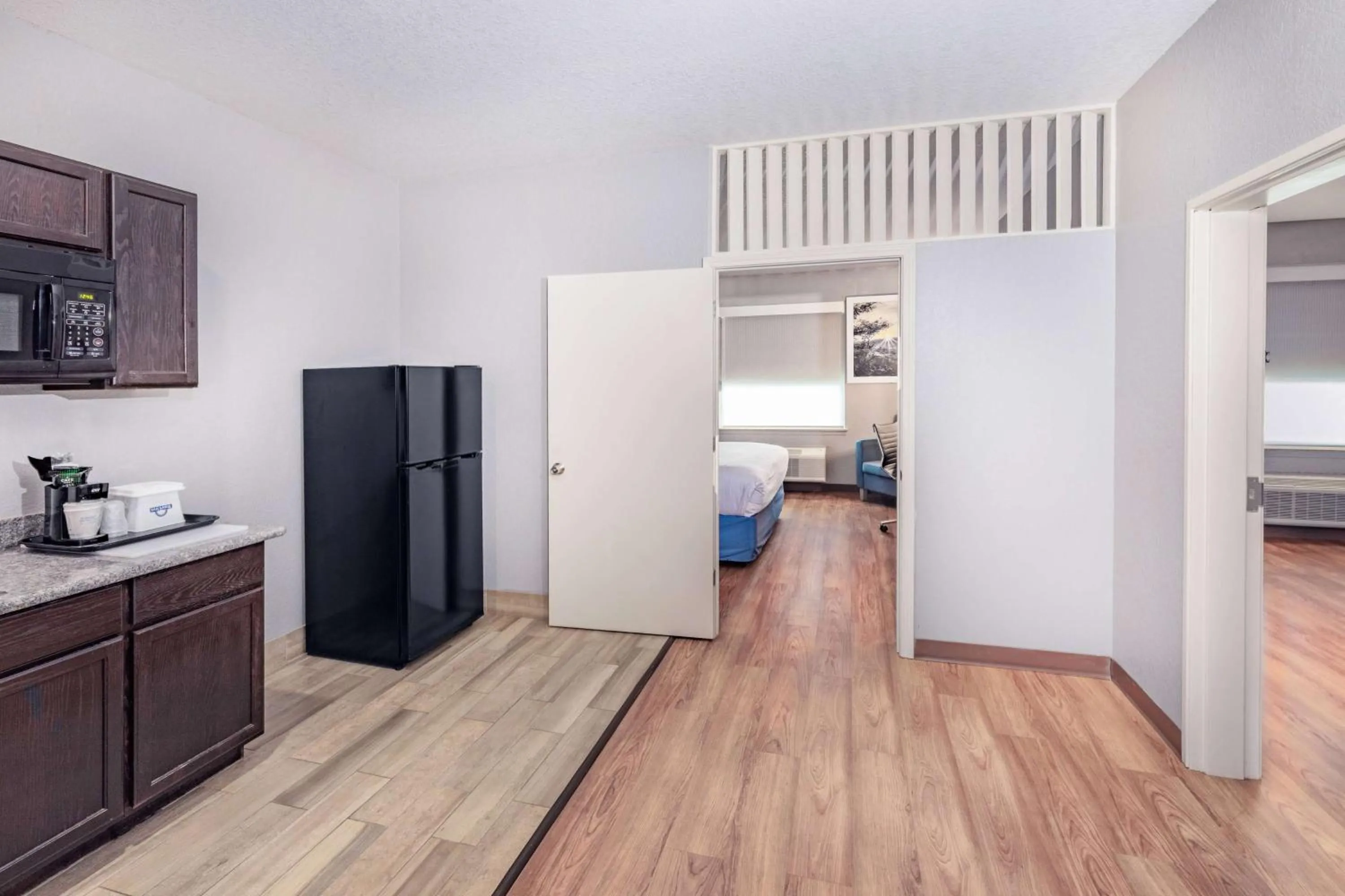 Photo of the whole room in Days Inn & Suites by Wyndham San Antonio near Frost Bank Center