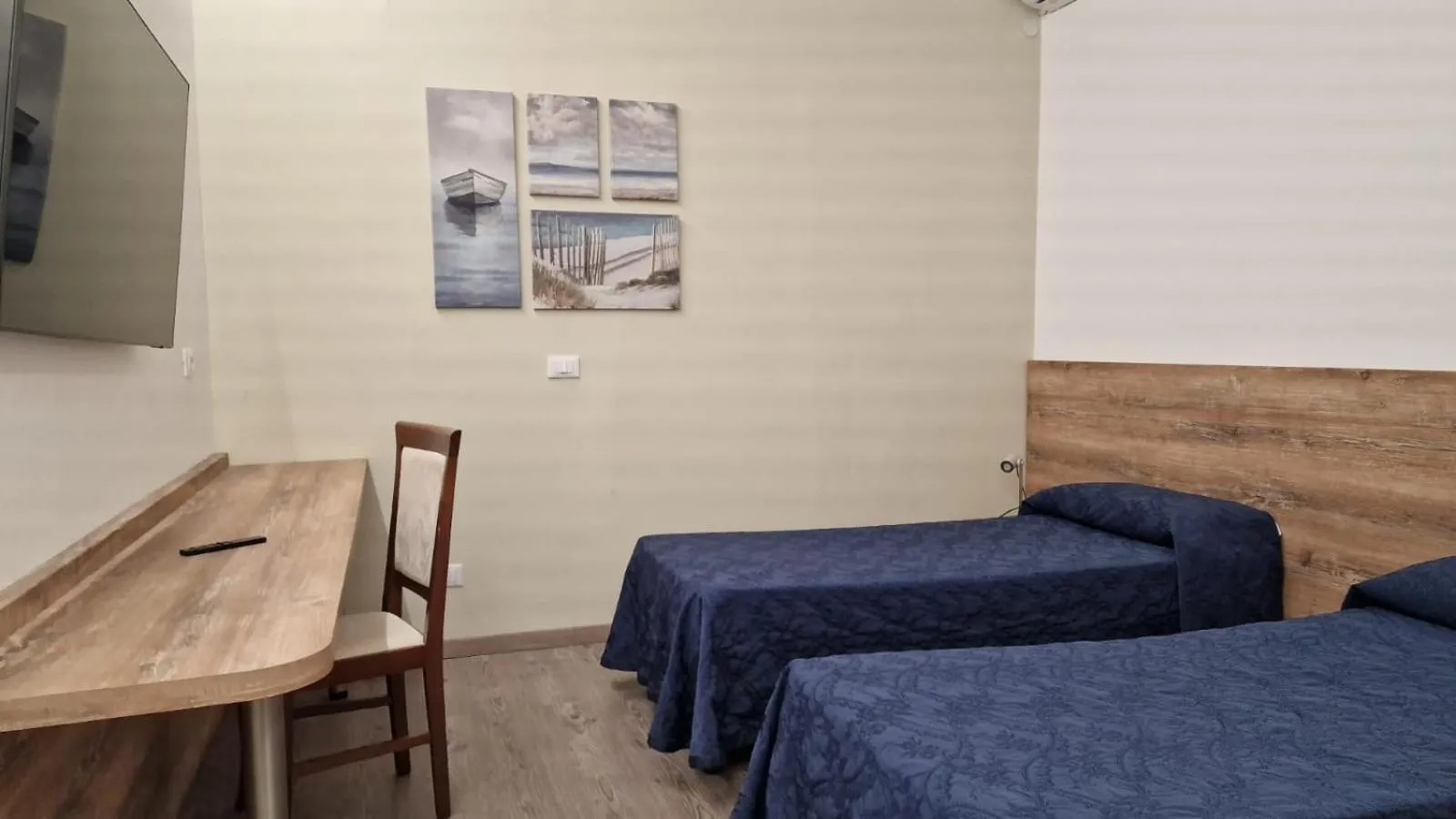 Bedroom in Hotel Milano