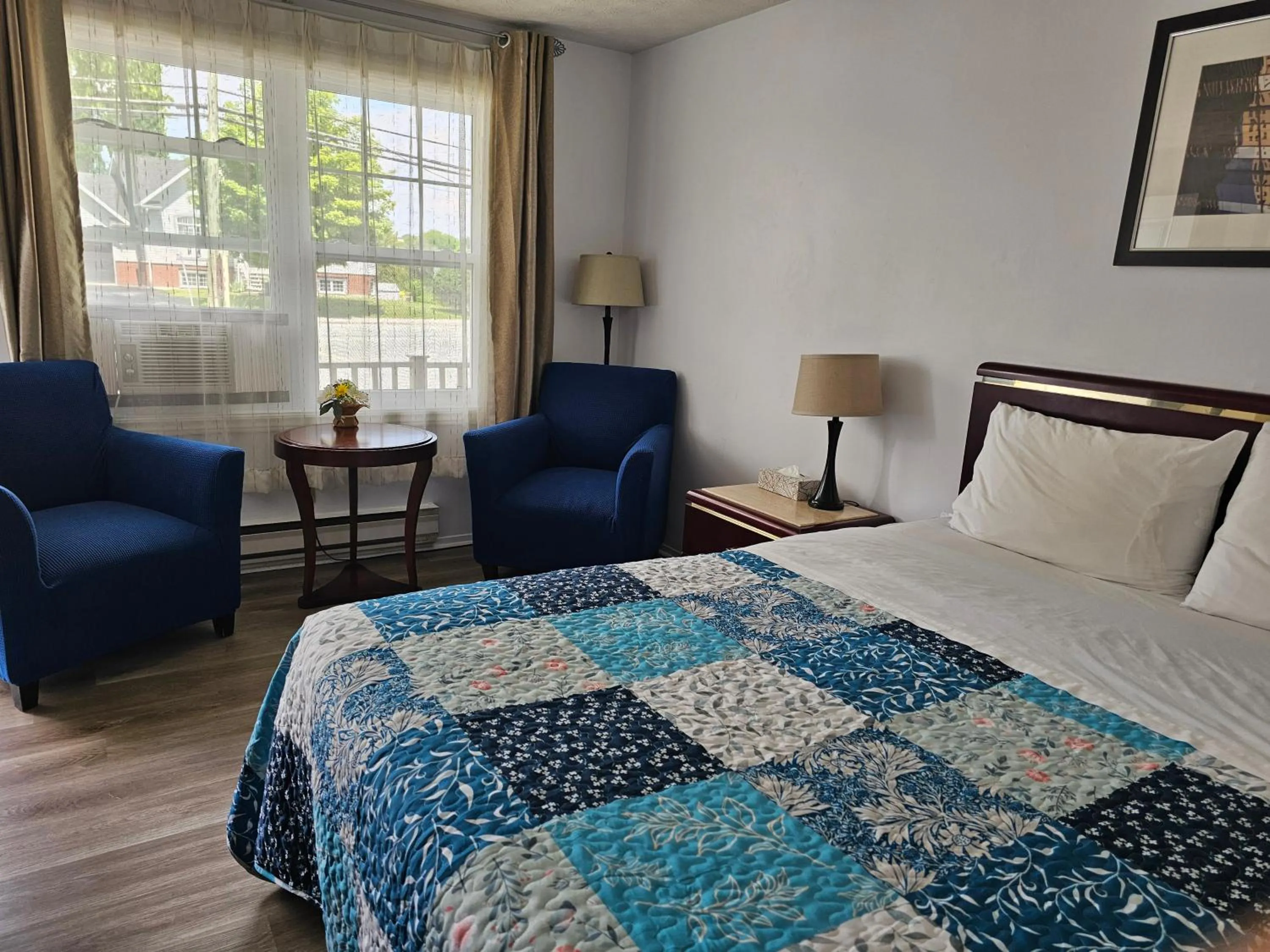 Bed in Motel de l'Outlet