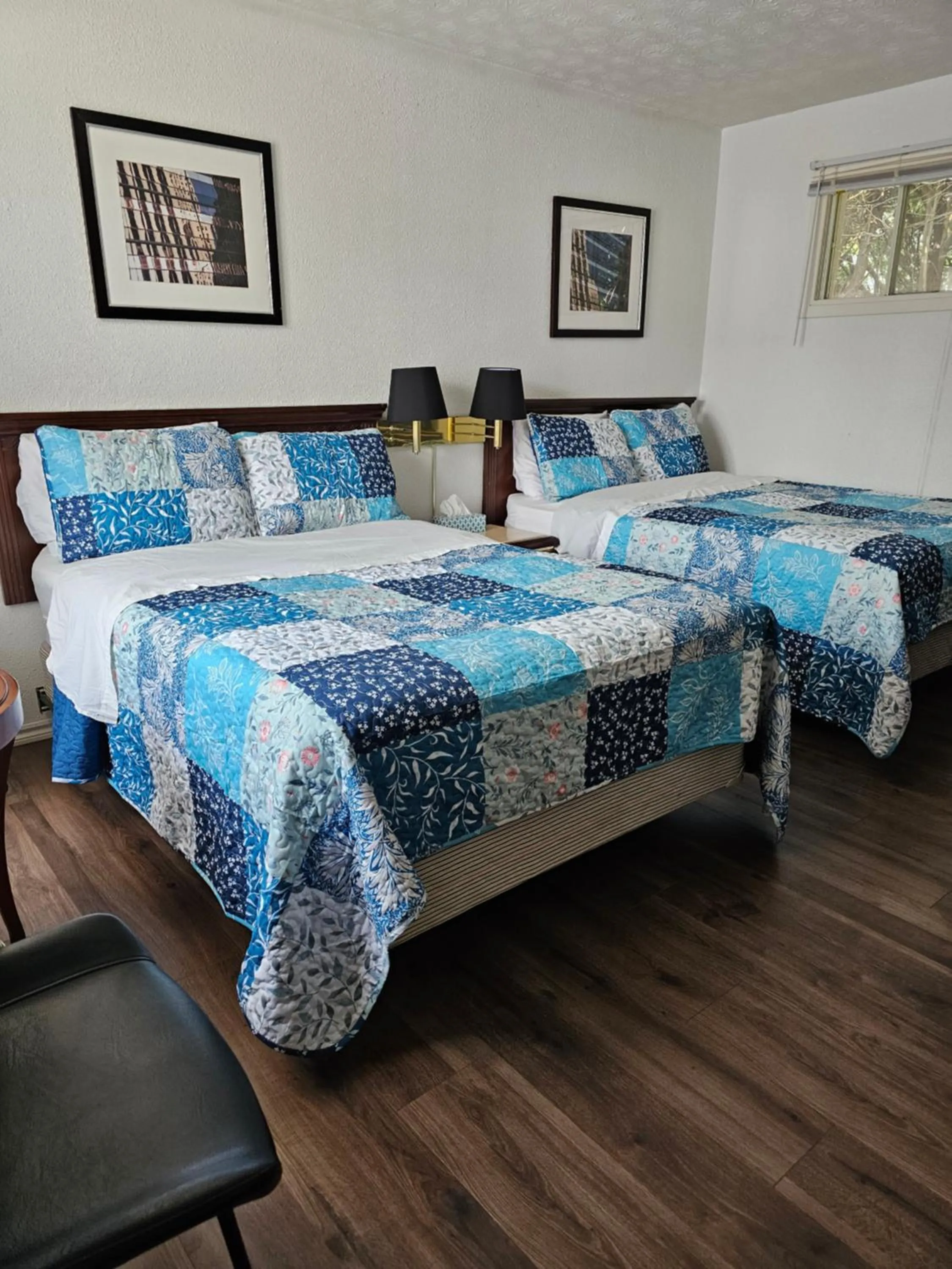 Bed in Motel de l'Outlet