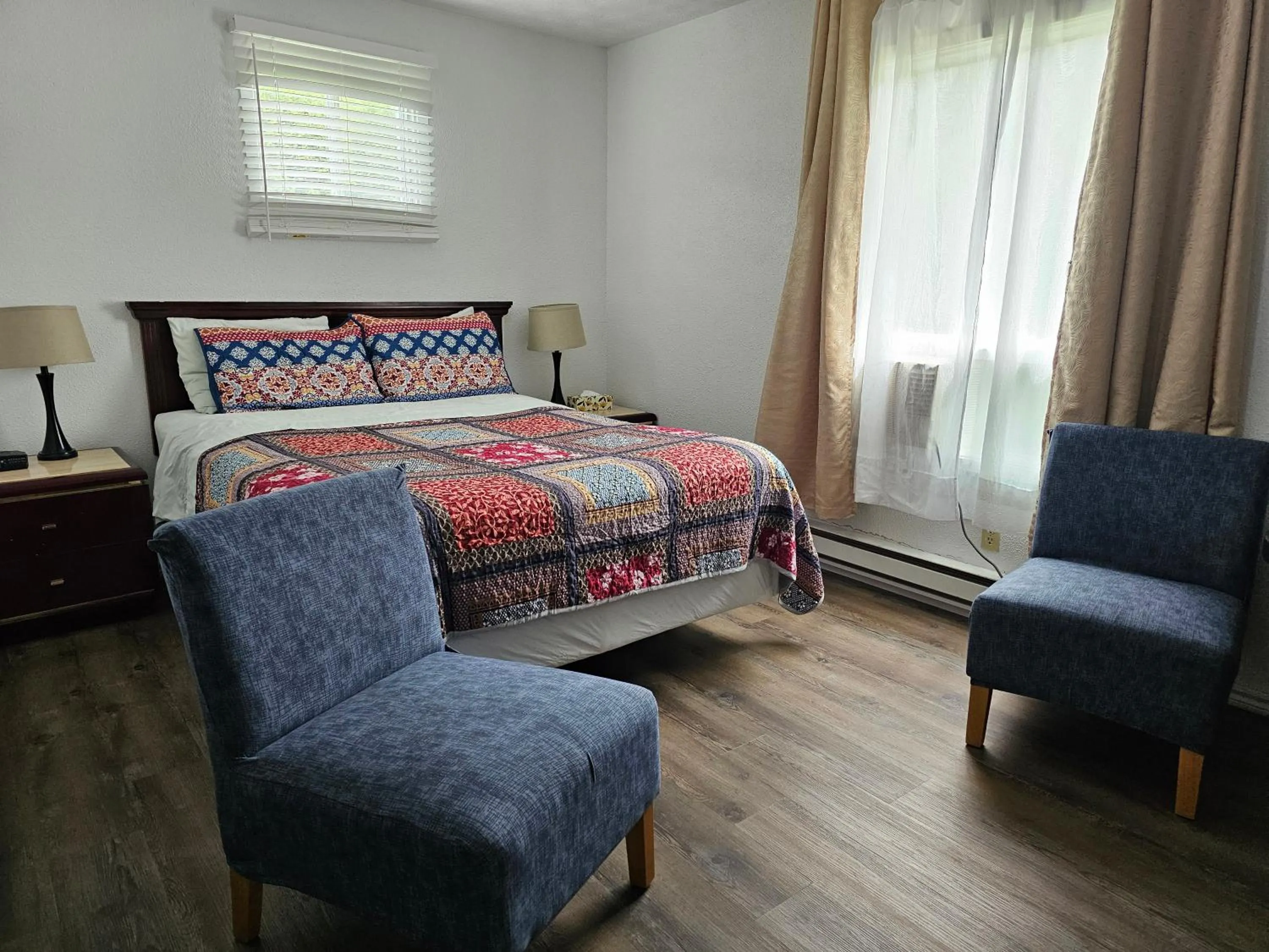 Bed in Motel de l'Outlet