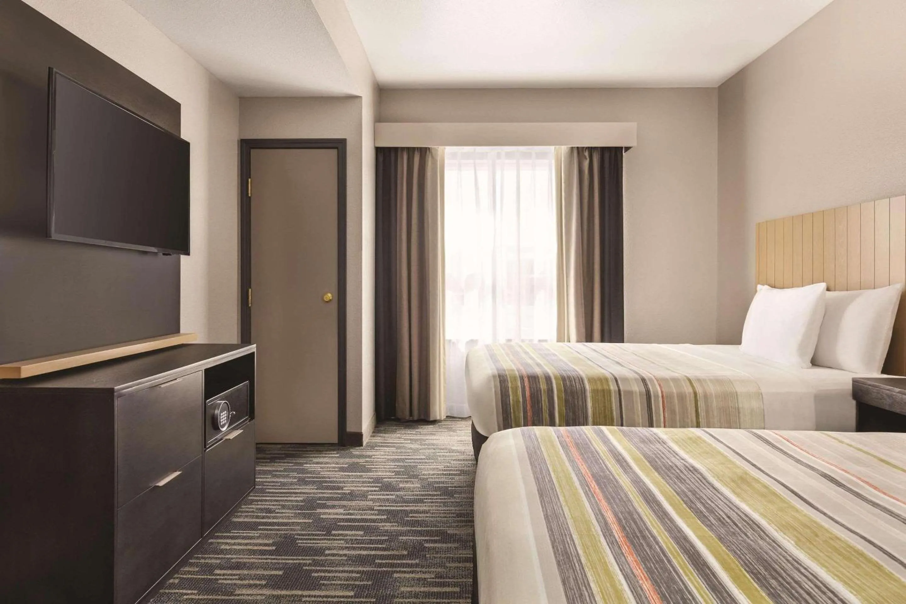 Bedroom, Bed in Country Inn & Suites by Radisson, Panama City Beach, FL