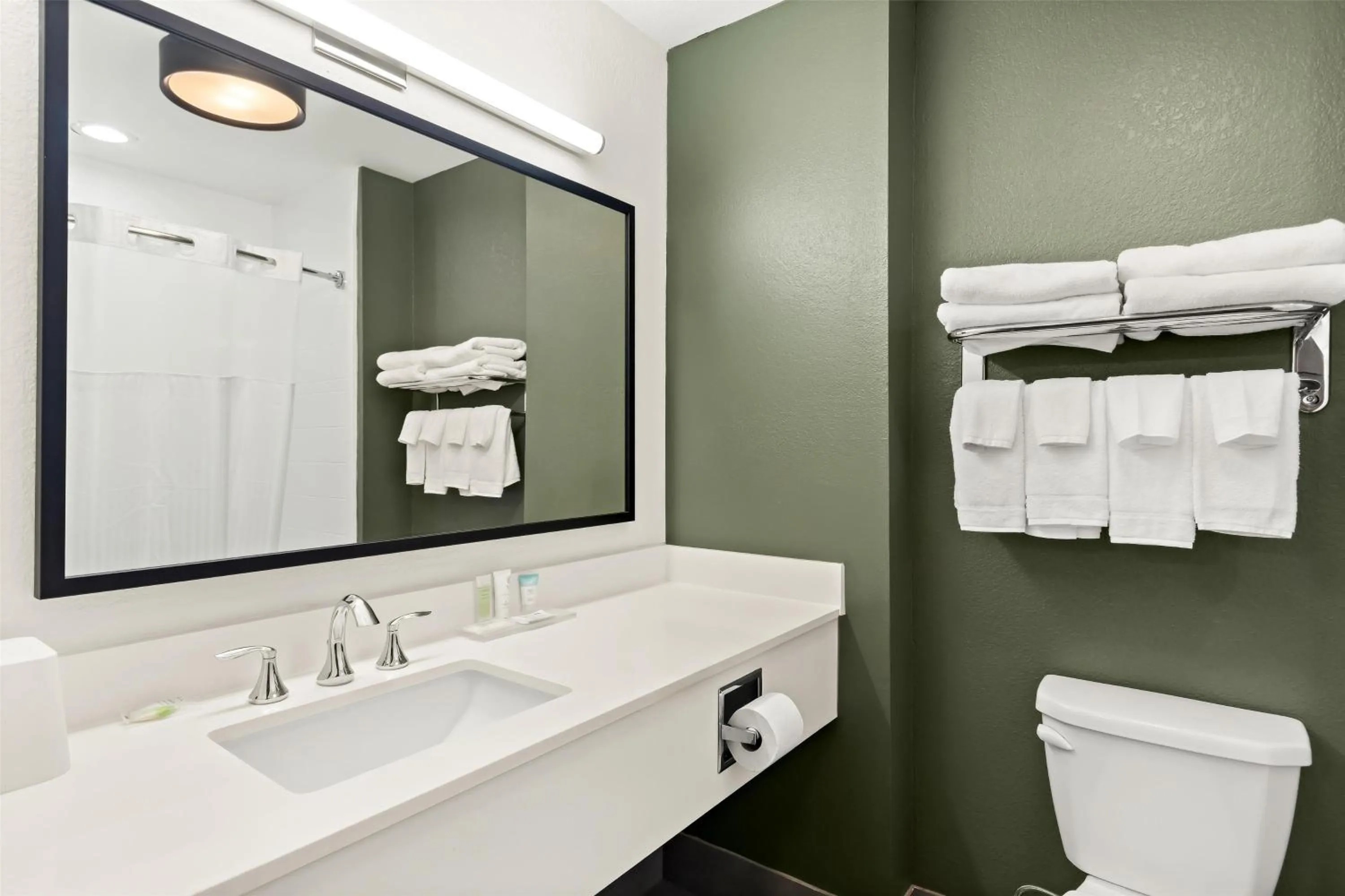 Bathroom in Spark by Hilton Panama City Beach