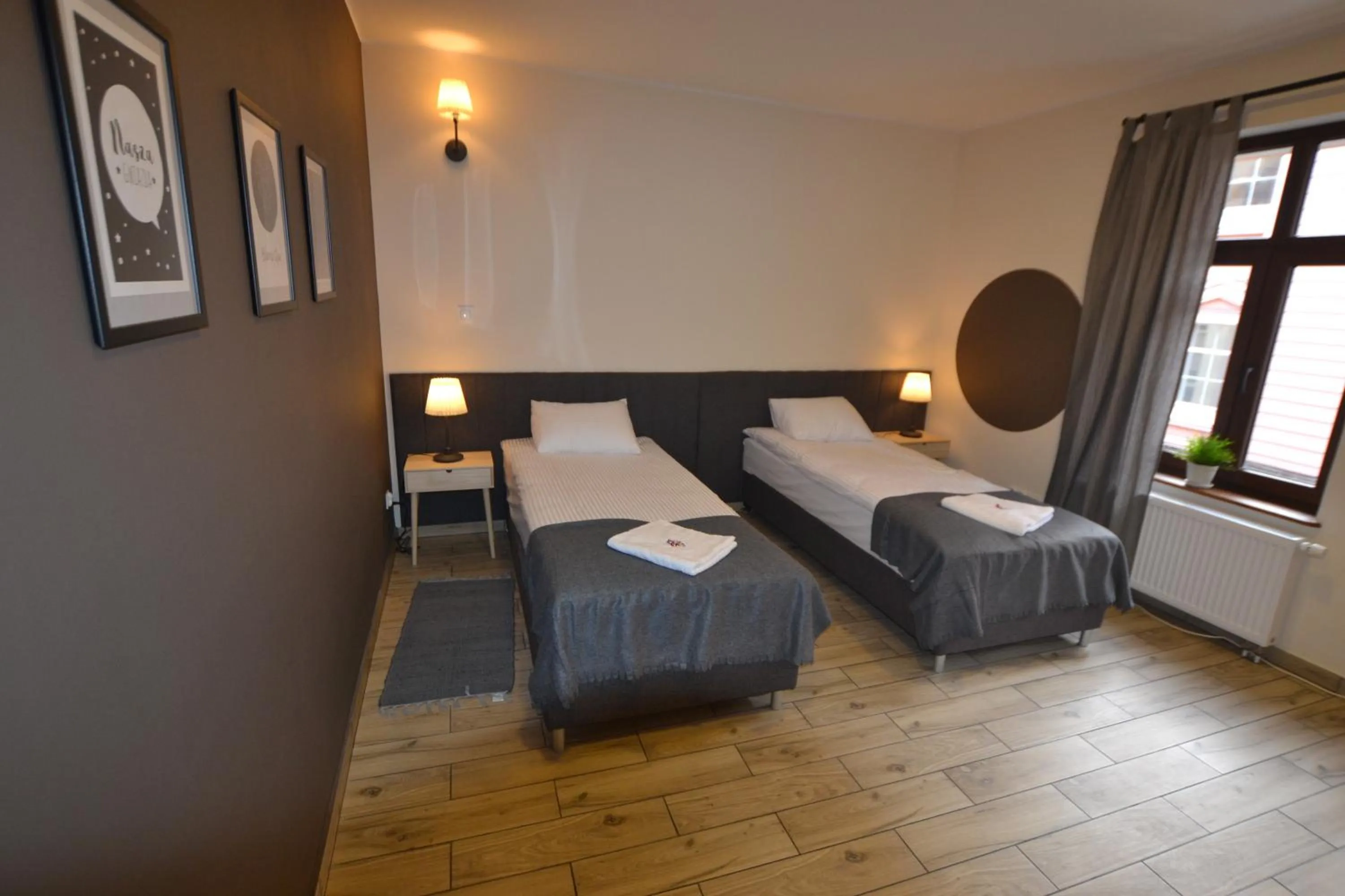 Photo of the whole room, Bed in SleepWell Apartments