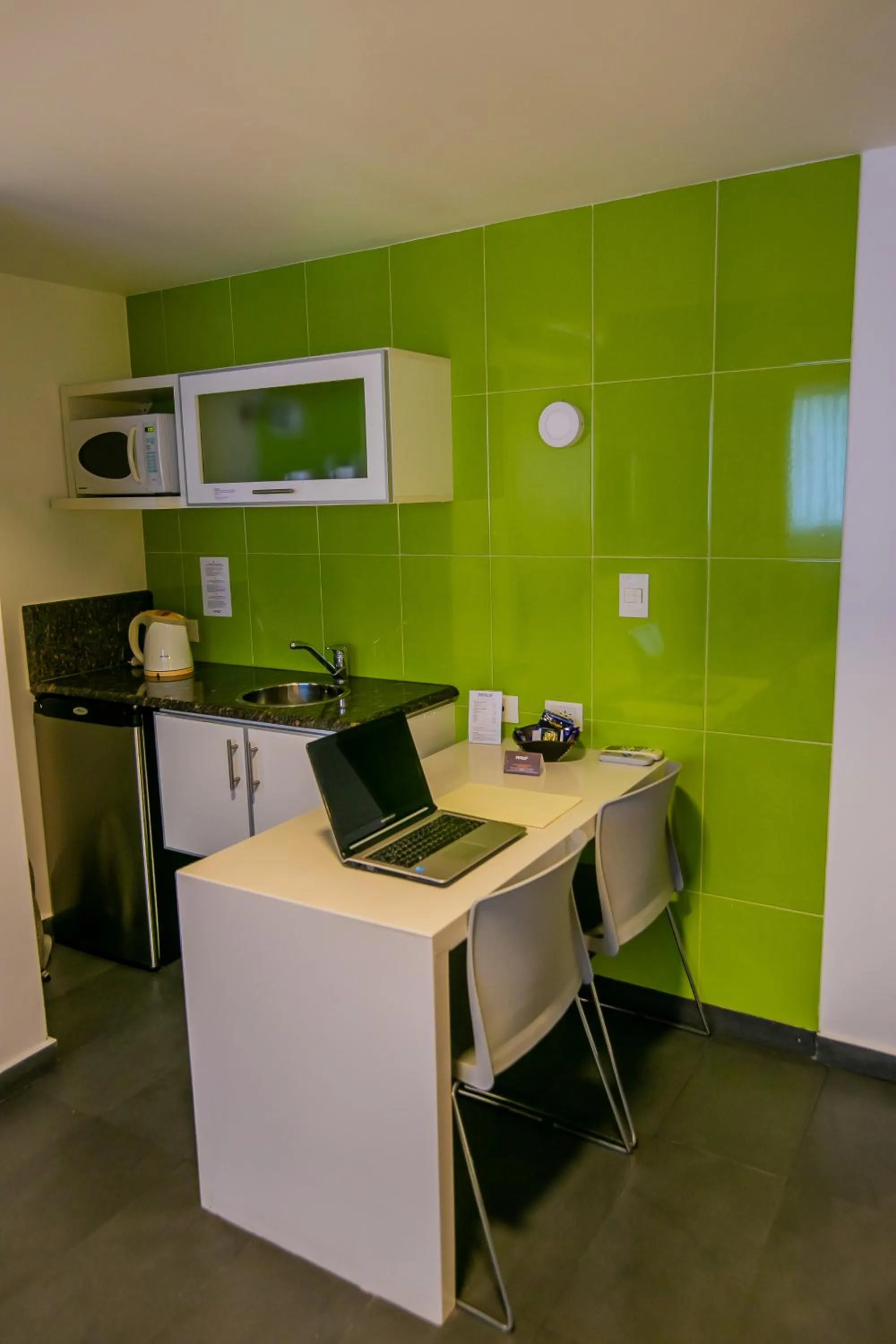 Kitchen or kitchenette in Roberta Rosa De Fontana Suites