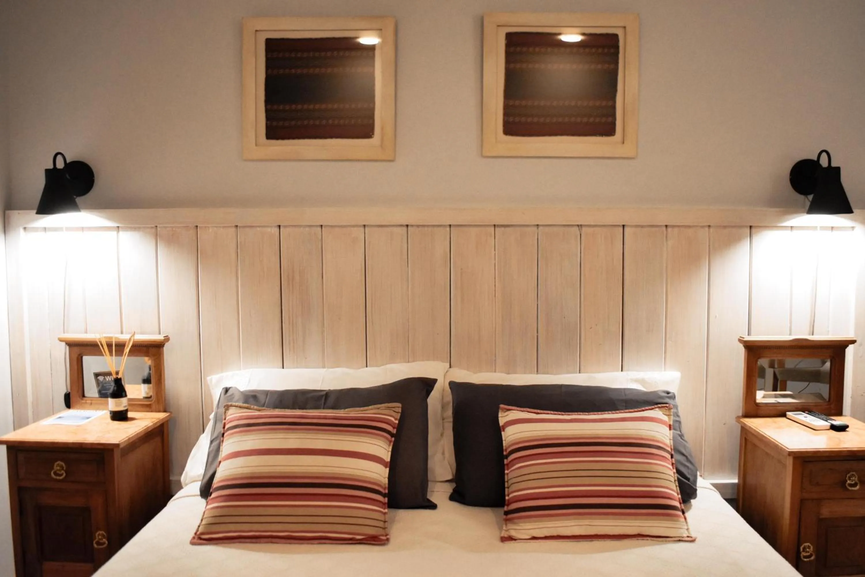 Bed in Las Bayas Home Suites