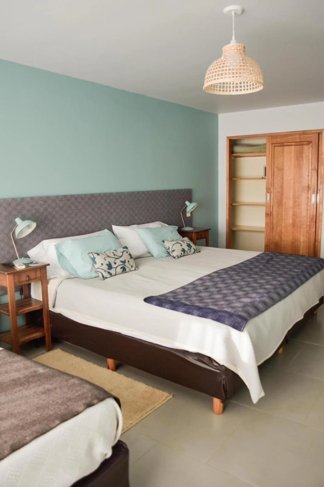 Bed in Las Bayas Home Suites