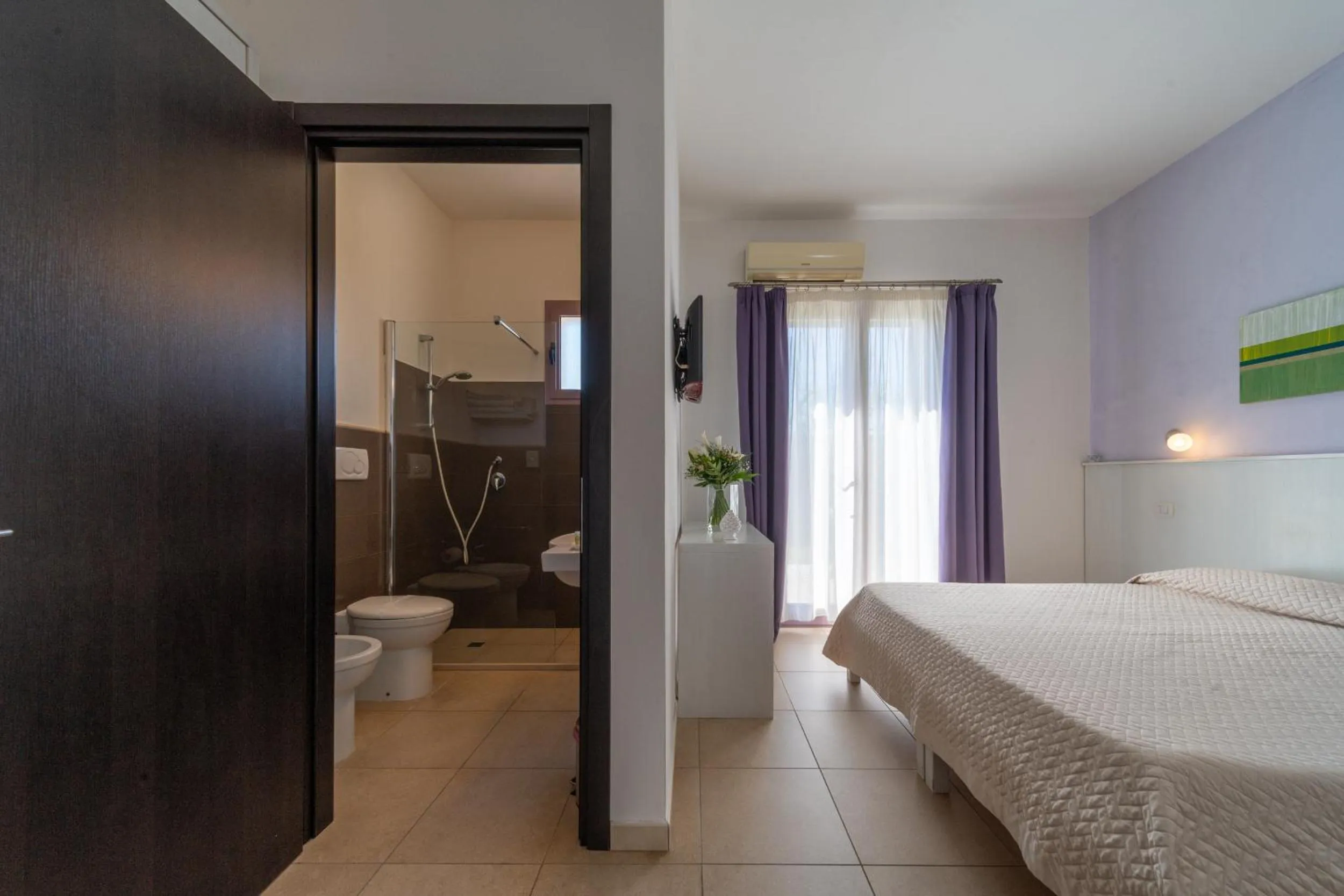Toilet, Bed in Corte dei Melograni Hotel Resort