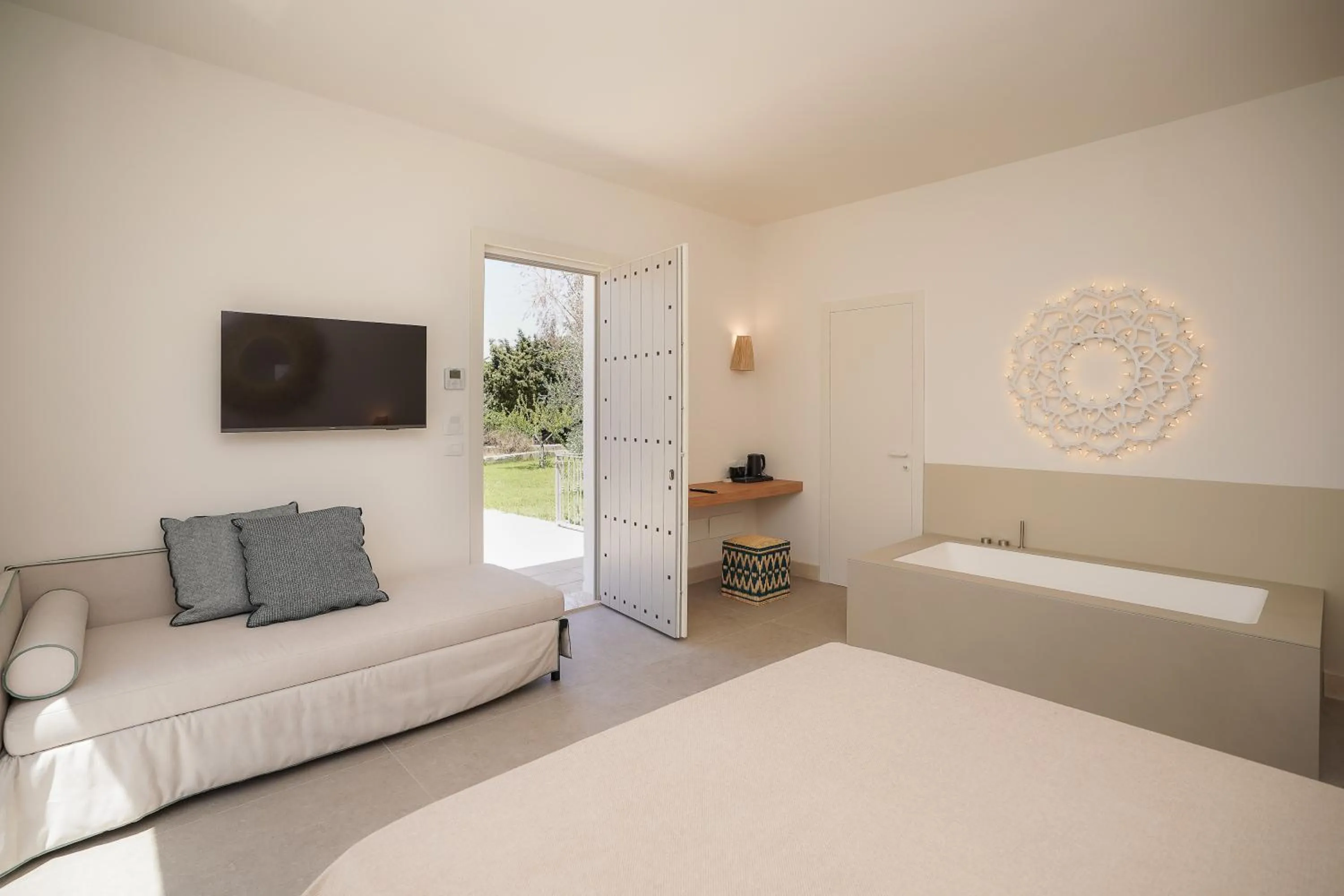 Living room, Bed in Corte dei Melograni Hotel Resort