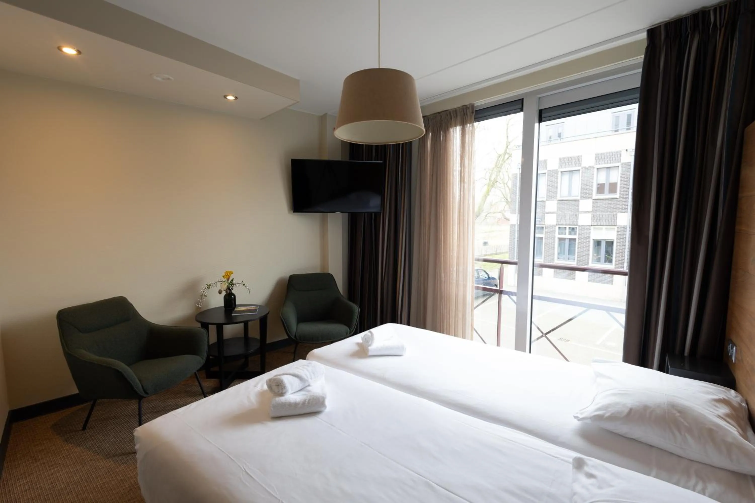 Bed in Stadshotel Doesburg