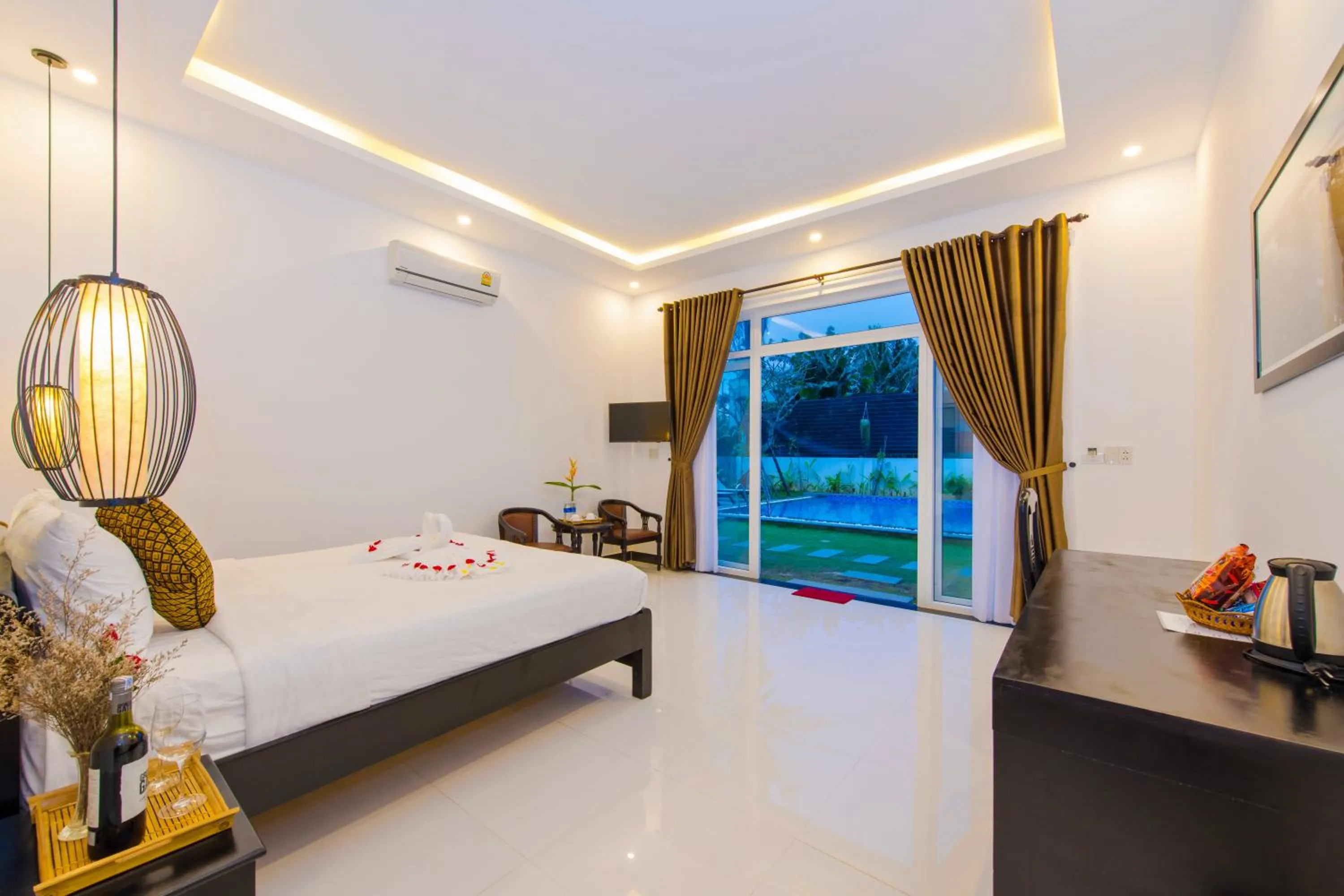 Seating area, Bed in Hoi An Sunny Pool Villa
