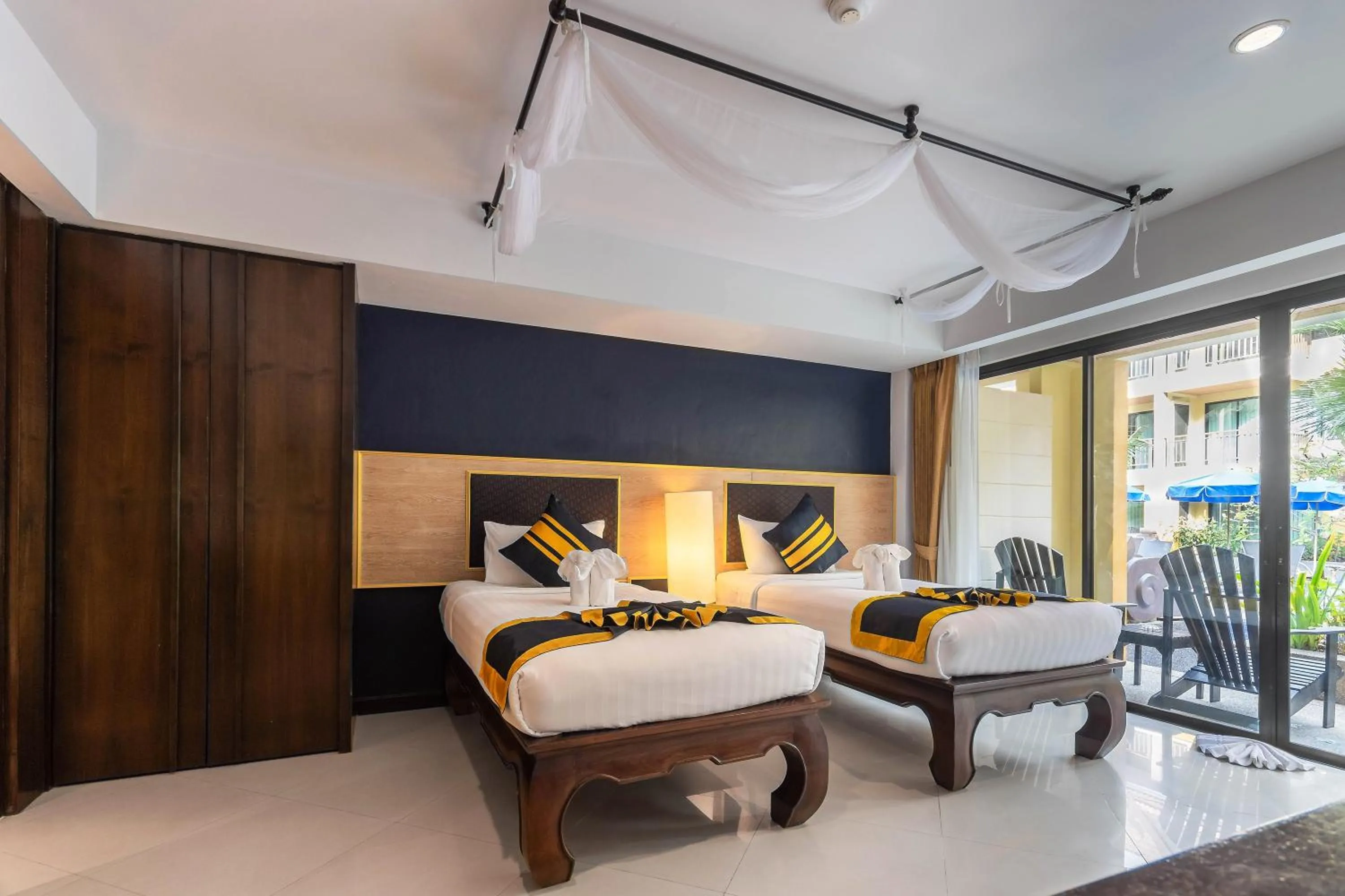 Bed in Diamond Cottage Resort & Spa