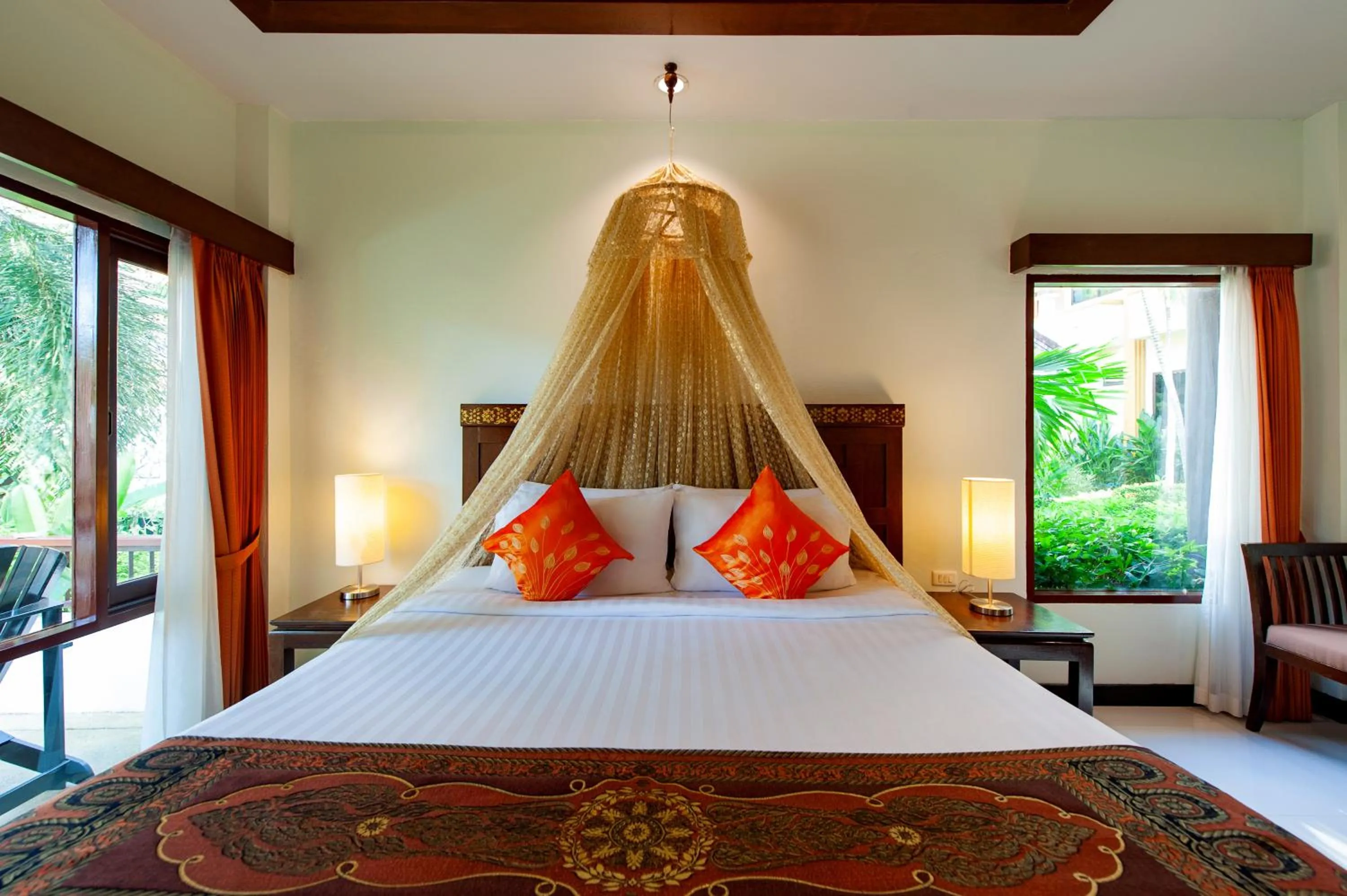 Bed in Diamond Cottage Resort & Spa