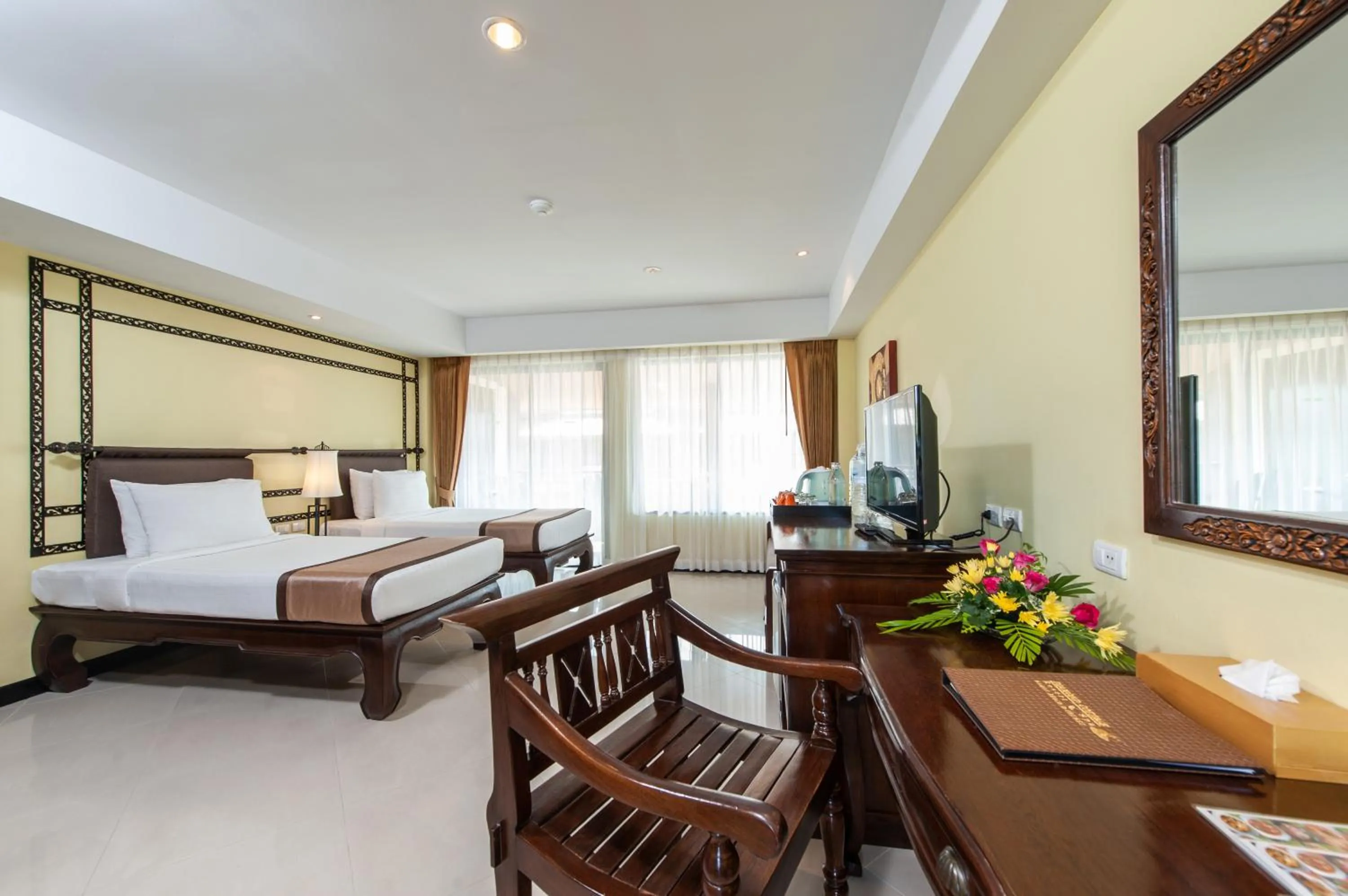 Bed in Diamond Cottage Resort & Spa