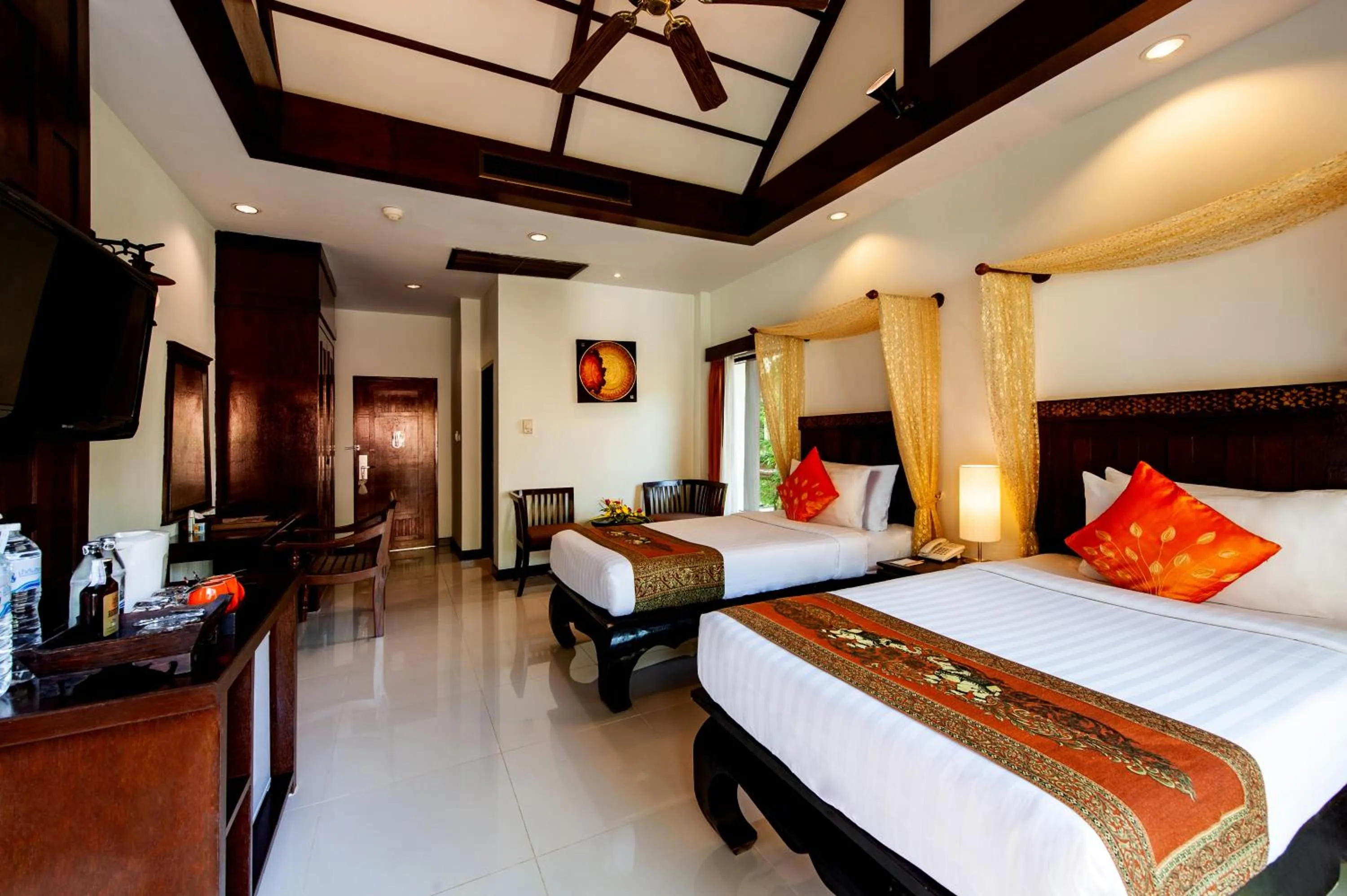 Bed in Diamond Cottage Resort & Spa