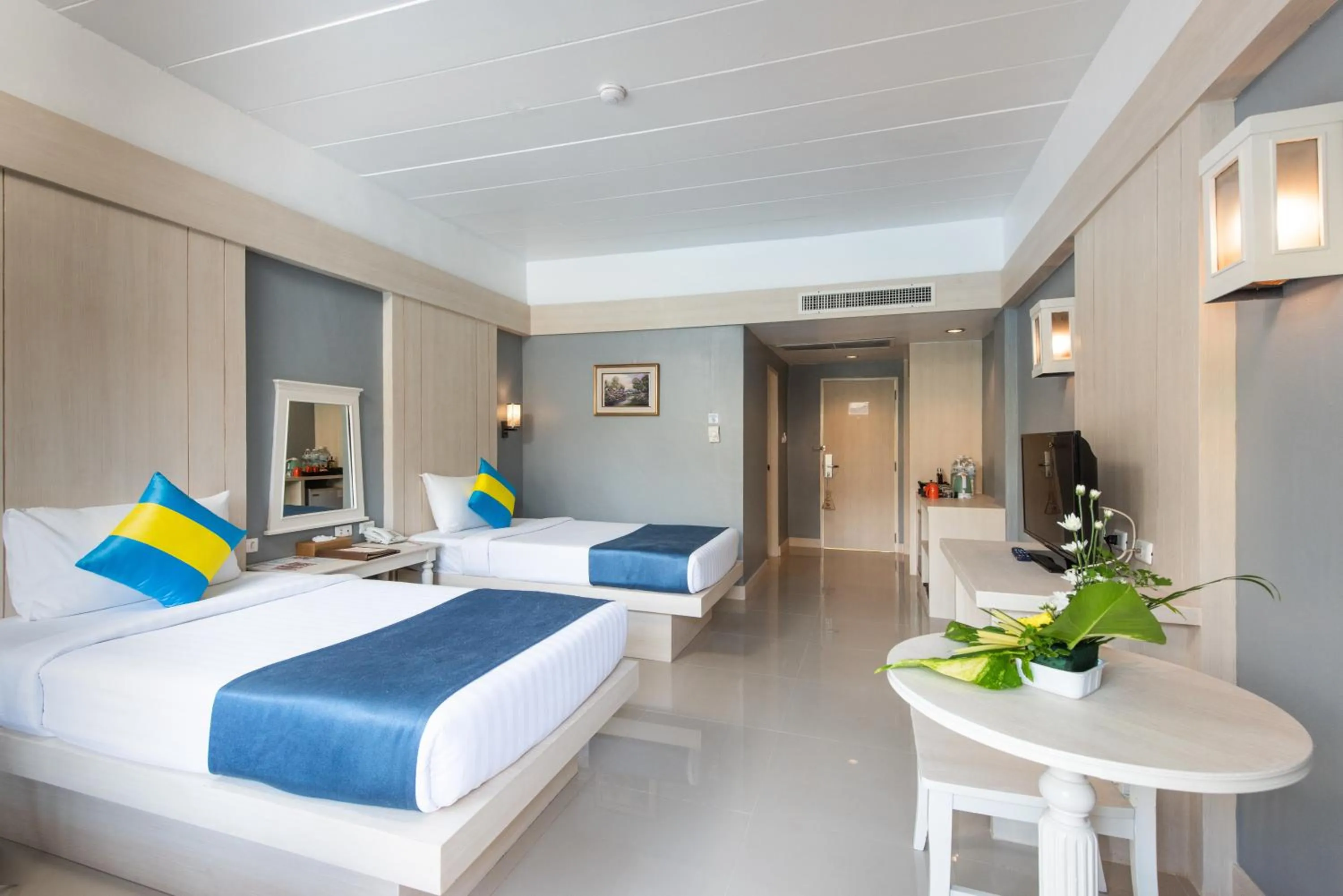 Bed in Diamond Cottage Resort & Spa