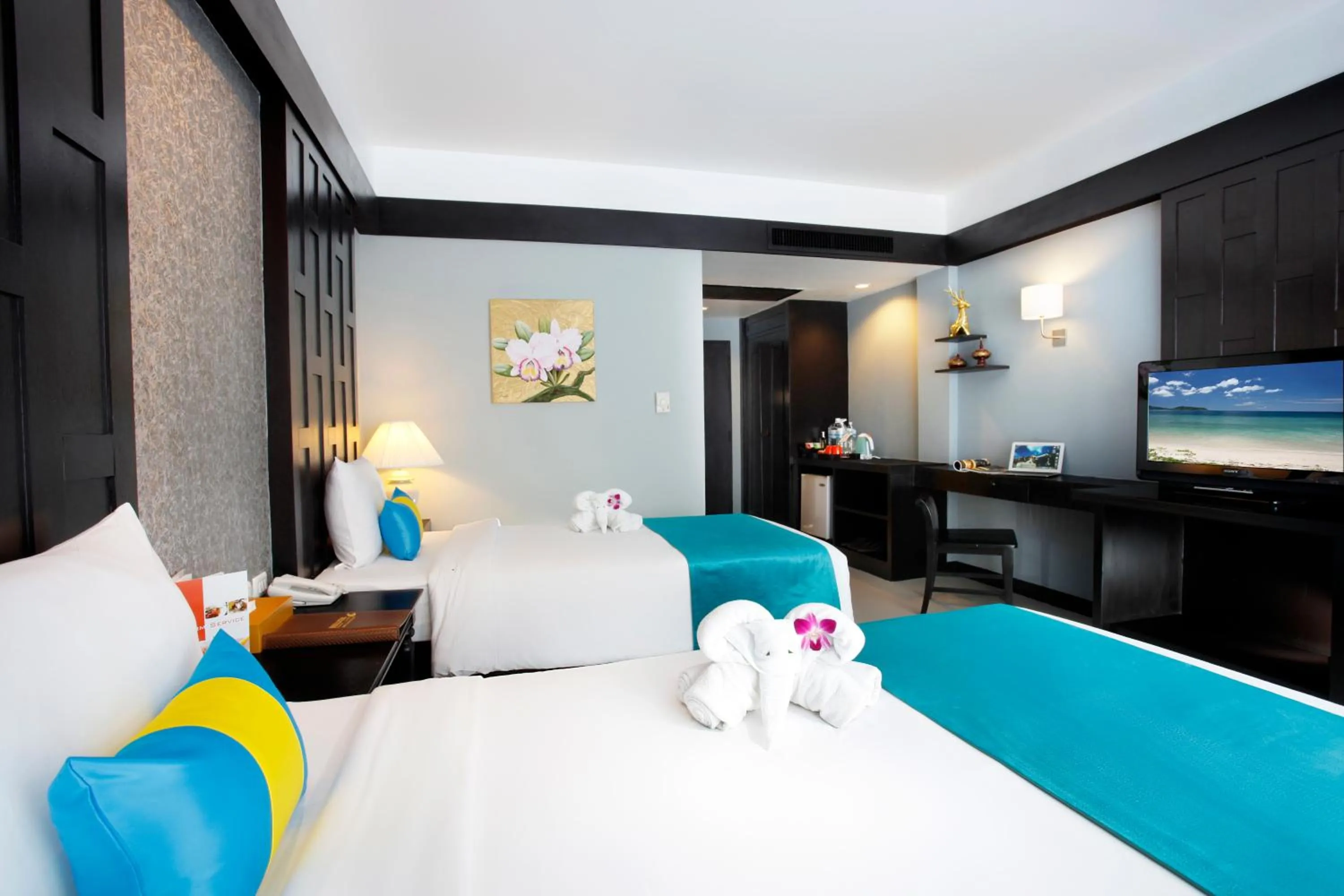 Bed in Diamond Cottage Resort & Spa