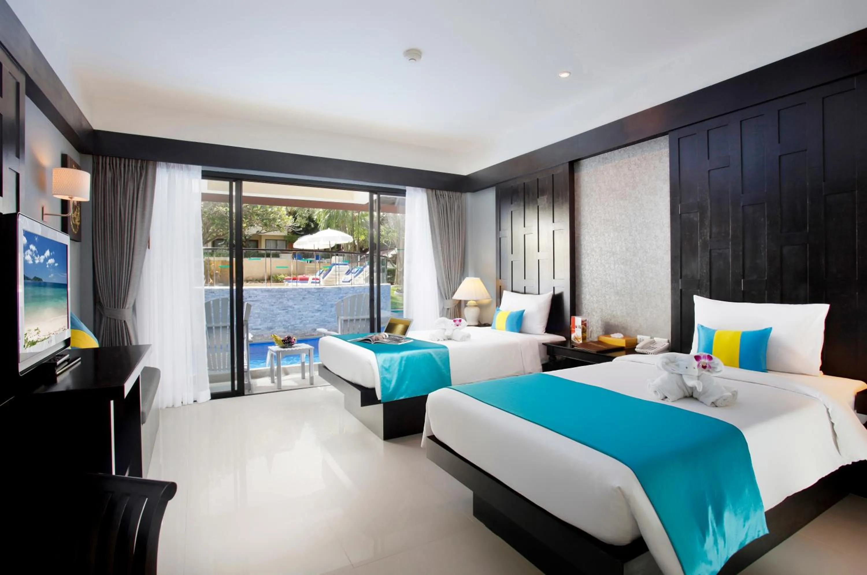 Bed in Diamond Cottage Resort & Spa