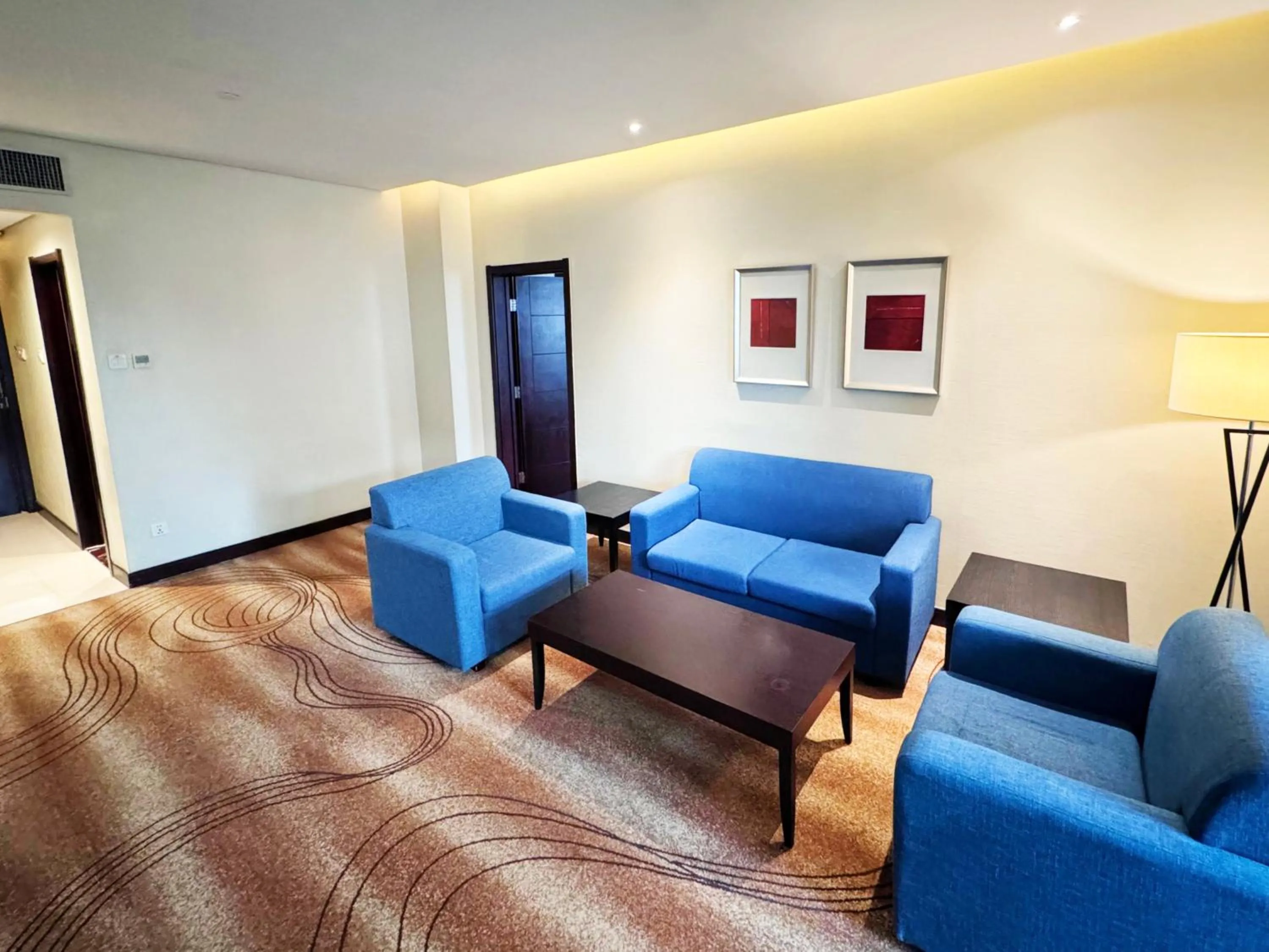 Living room in Holiday Inn Beijing Chang An West by IHG